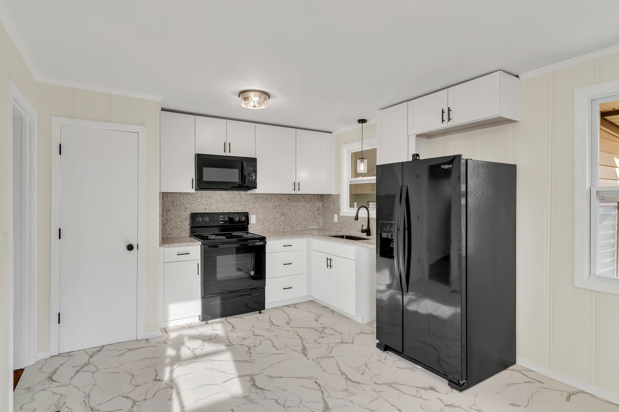 1408 Bain Drive Madison, TN 37115 - Photo 13 of 32 a kitchen with stainless steel appliances granite countertop a refrigerator and a stove top oven