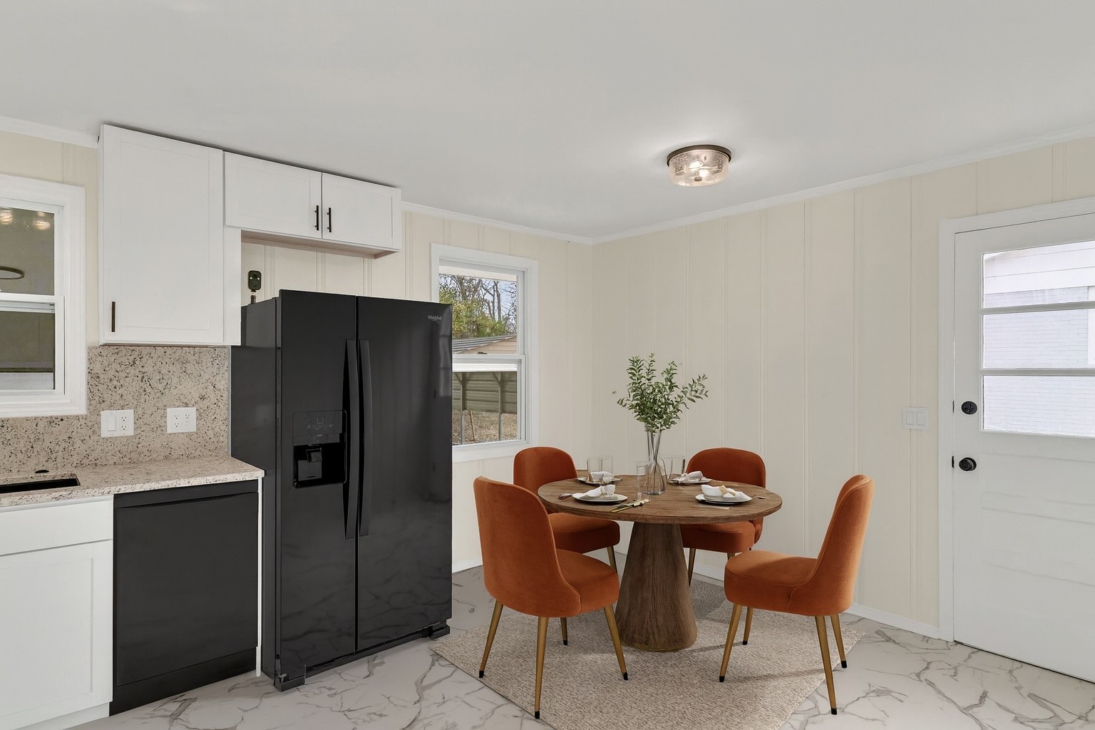1408 Bain Drive Madison, TN 37115 - Photo 14 of 32 a kitchen with stainless steel appliances a refrigerator and a dining table