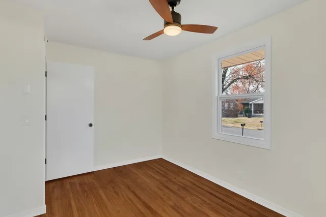 a view of an empty room and window