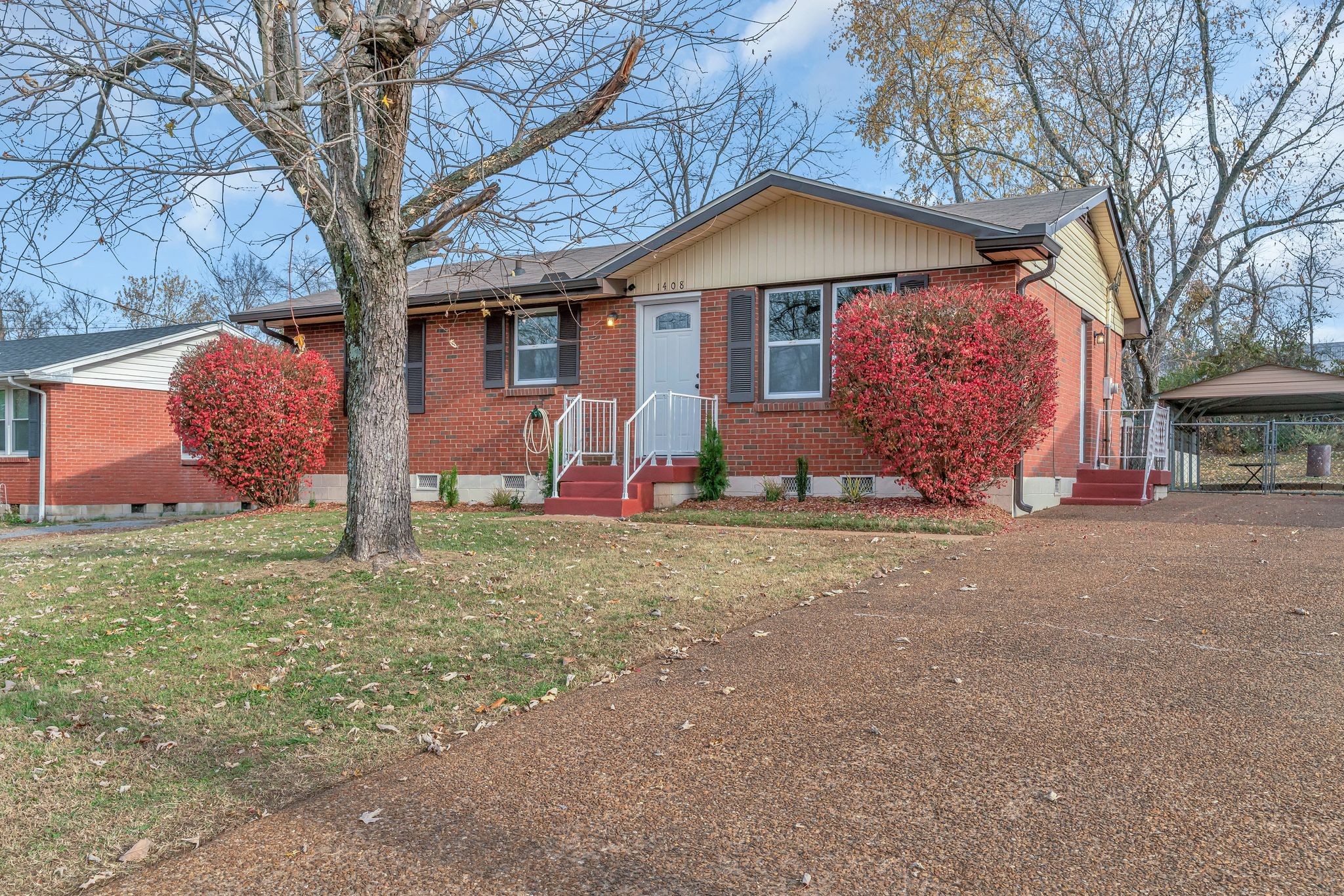 1408 Bain Drive Madison, TN 37115 - Photo 2 of 32 a front view of a house with garden