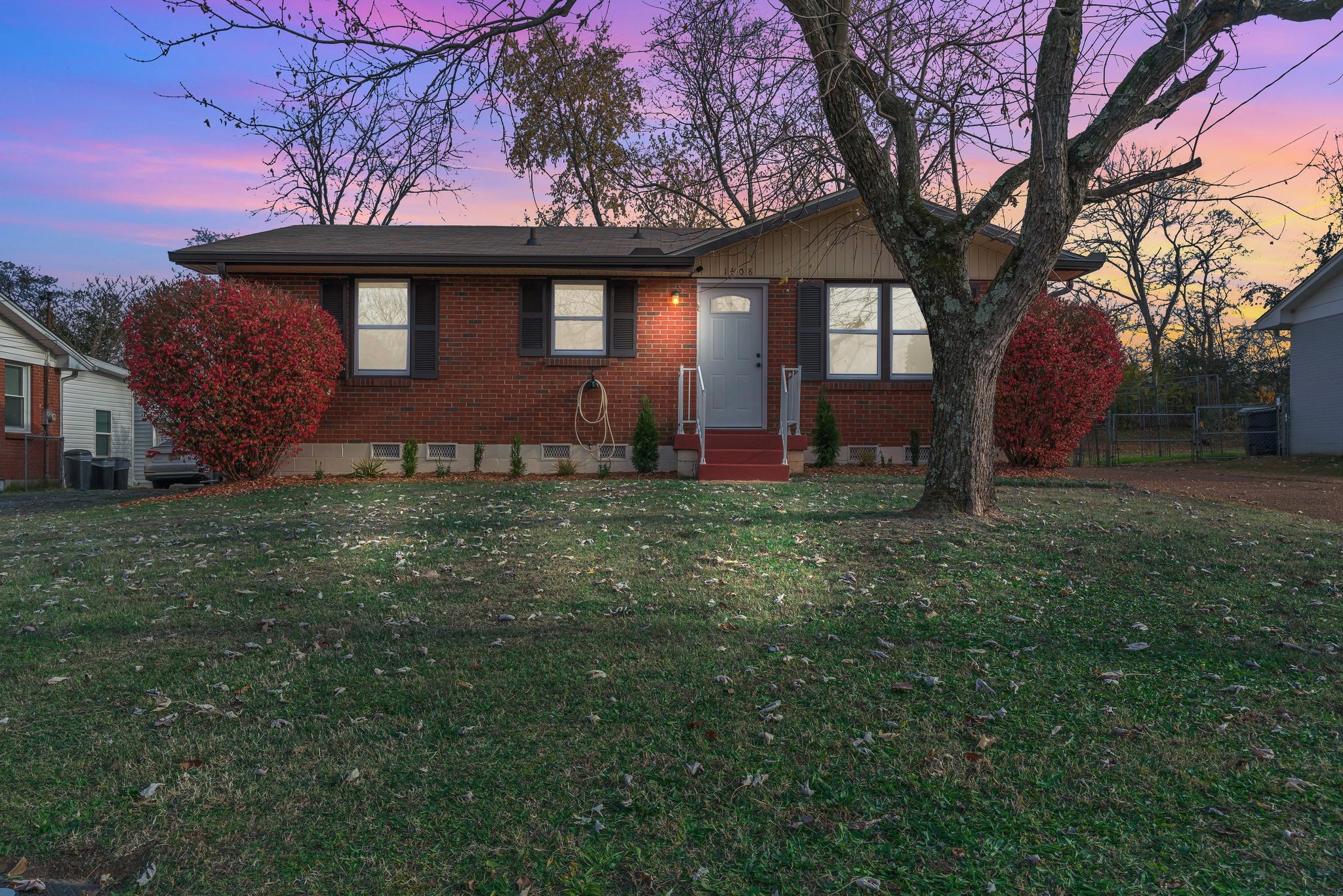 1408 Bain Drive Madison, TN 37115 - Photo 32 of 32 a front view of a house with garden
