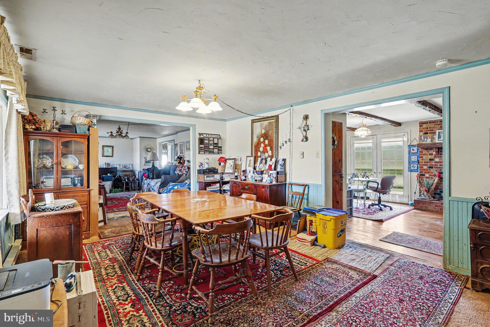 22244 Sam Fred Road Middleburg, VA 20117 - Photo 26 of 51 a view of a dining room with furniture