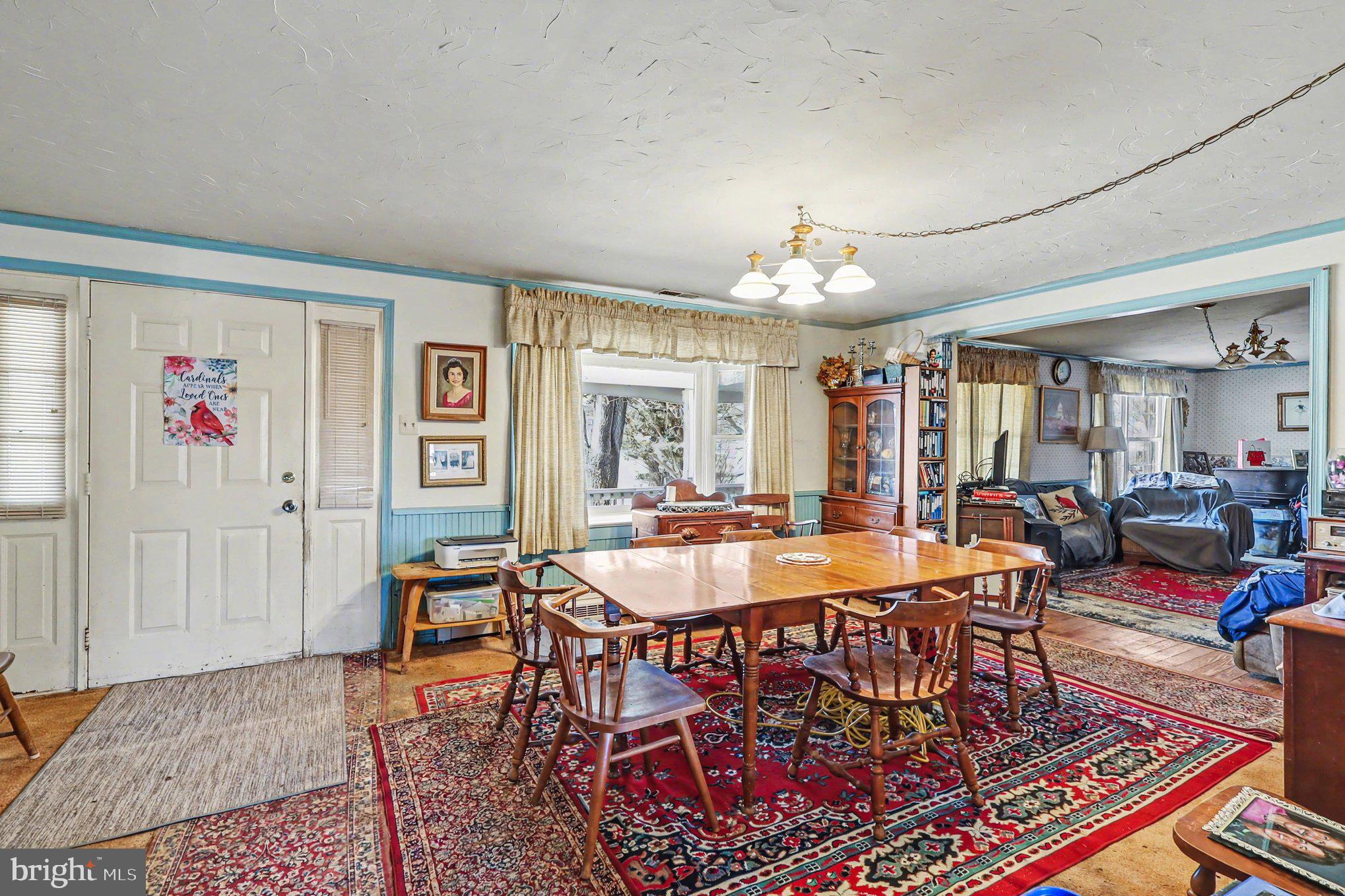 22244 Sam Fred Road Middleburg, VA 20117 - Photo 27 of 51 a view of a dining room with furniture