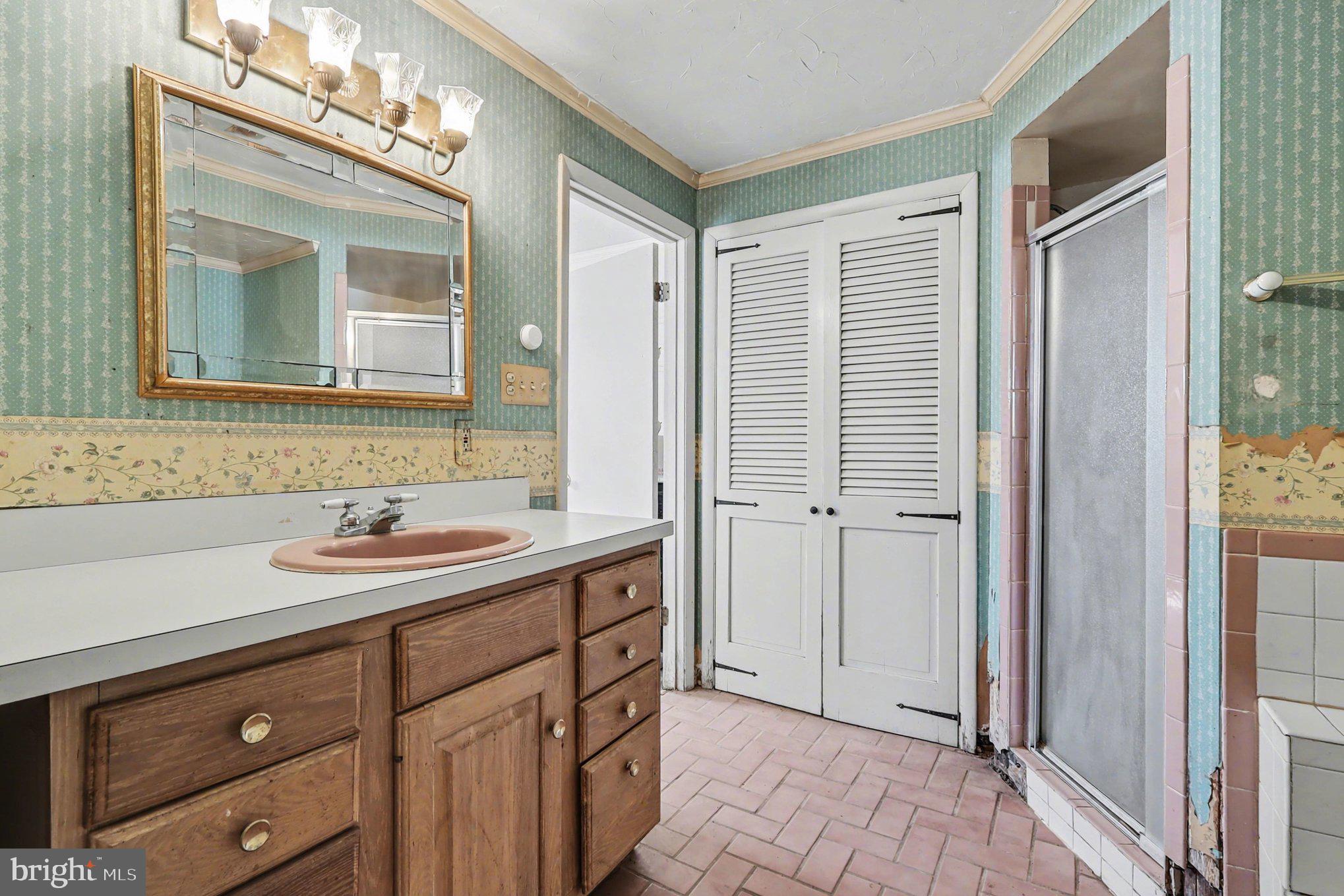 22244 Sam Fred Road Middleburg, VA 20117 - Photo 41 of 51 a bathroom with a sink and a mirror