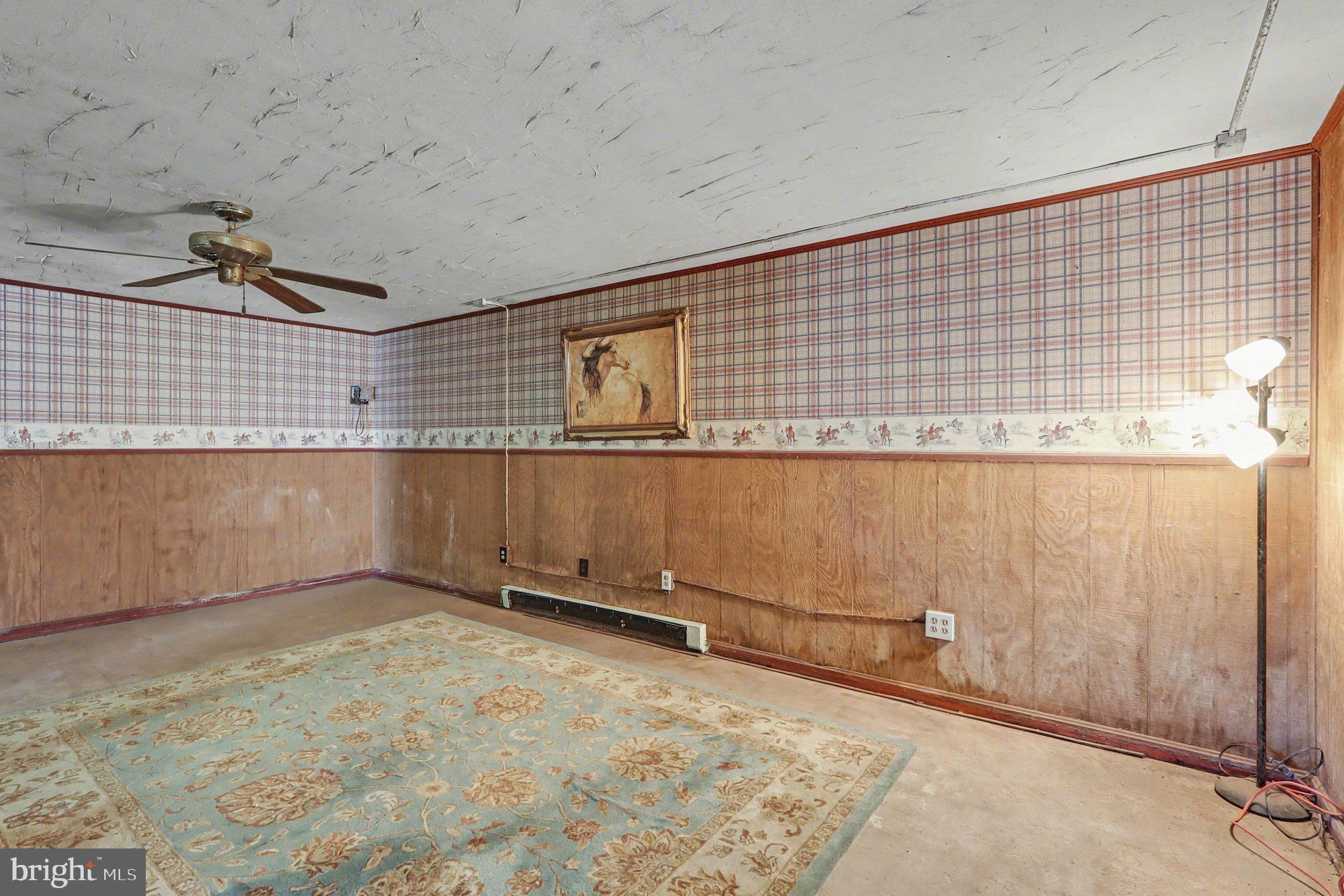 22244 Sam Fred Road Middleburg, VA 20117 - Photo 45 of 51 a view of a room with rack on the wall
