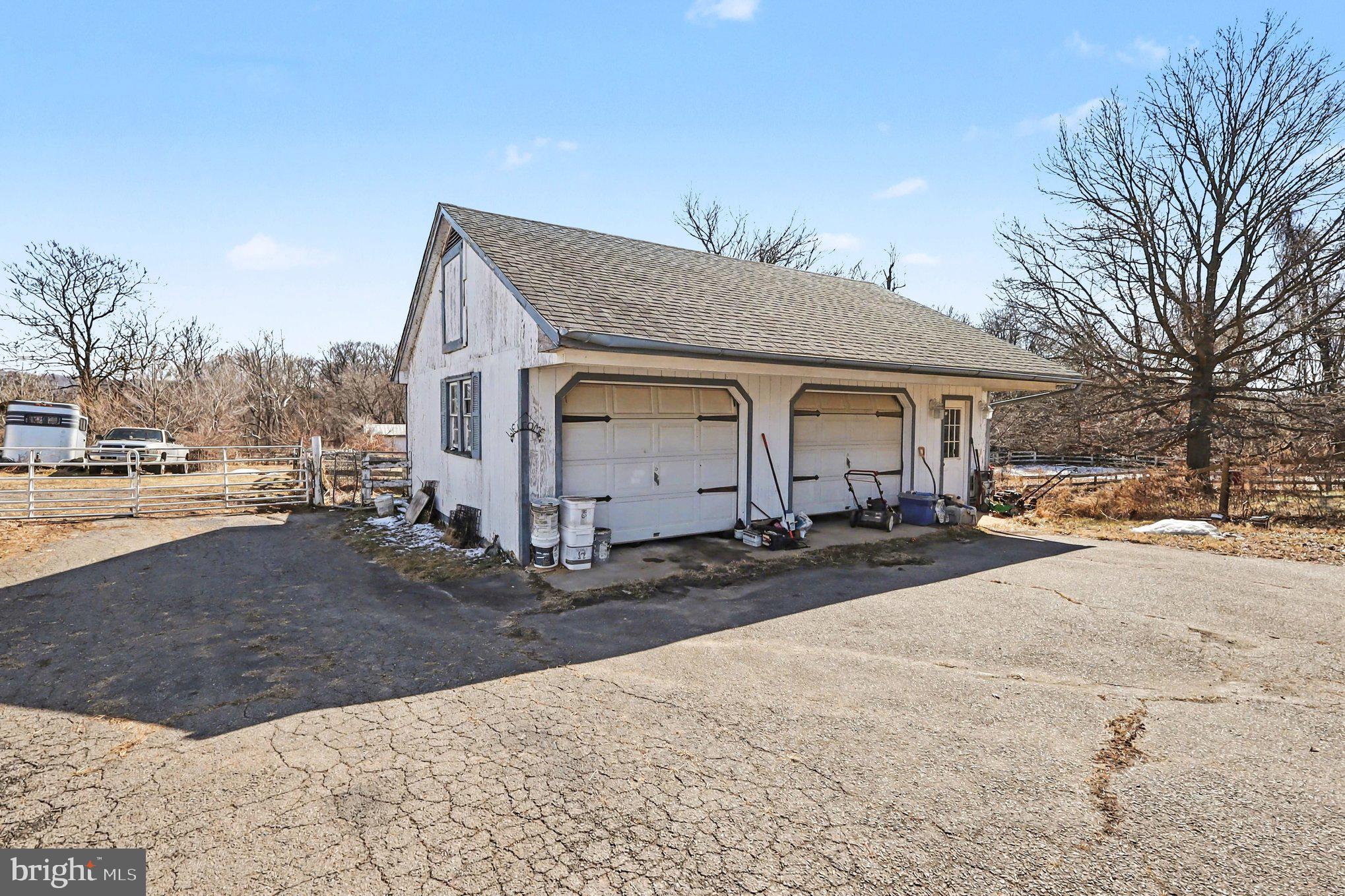 22244 Sam Fred Road Middleburg, VA 20117 - Photo 48 of 51 a view of a house with a yard