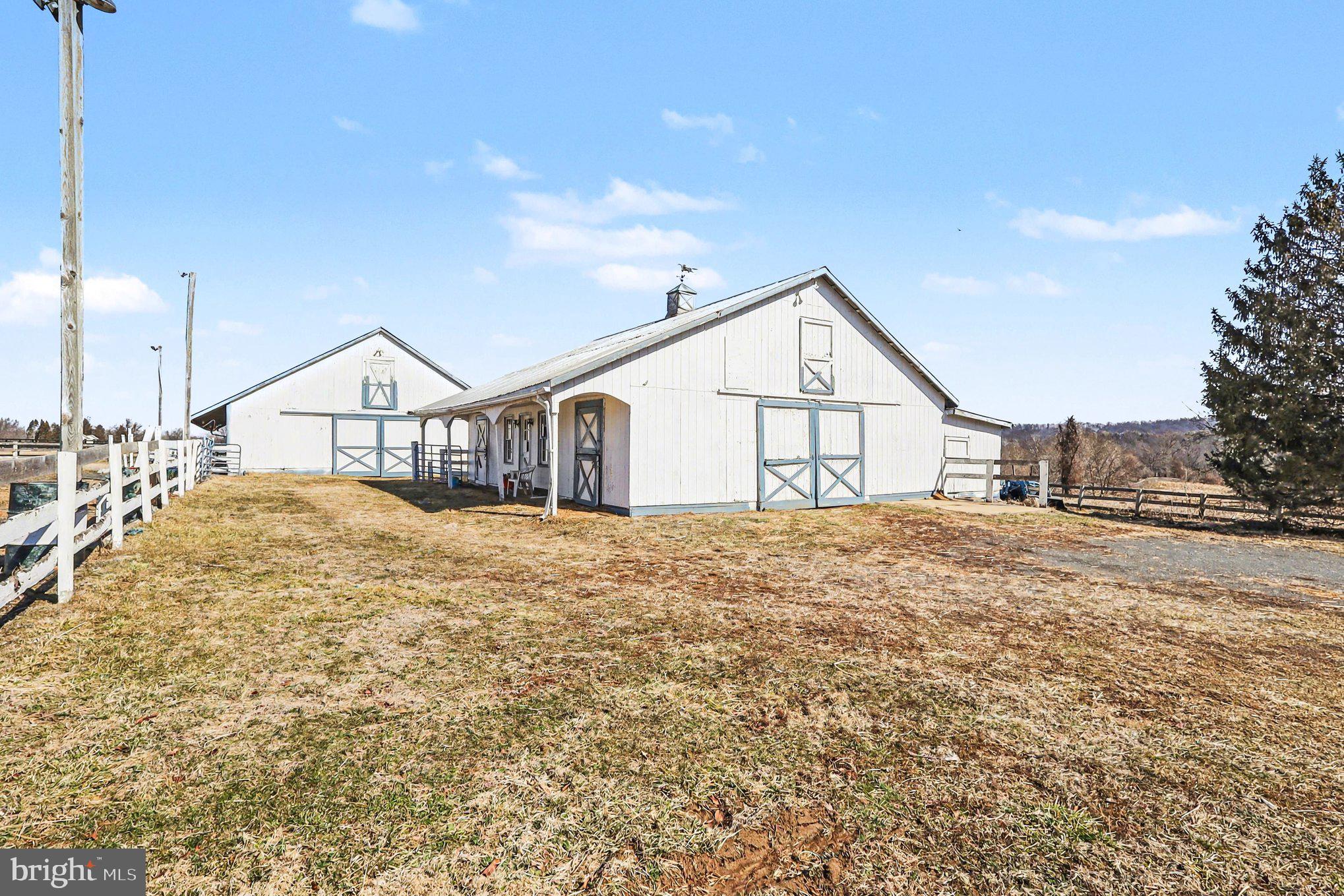 22244 Sam Fred Road Middleburg, VA 20117 - Photo 7 of 51 a house view with a outdoor space