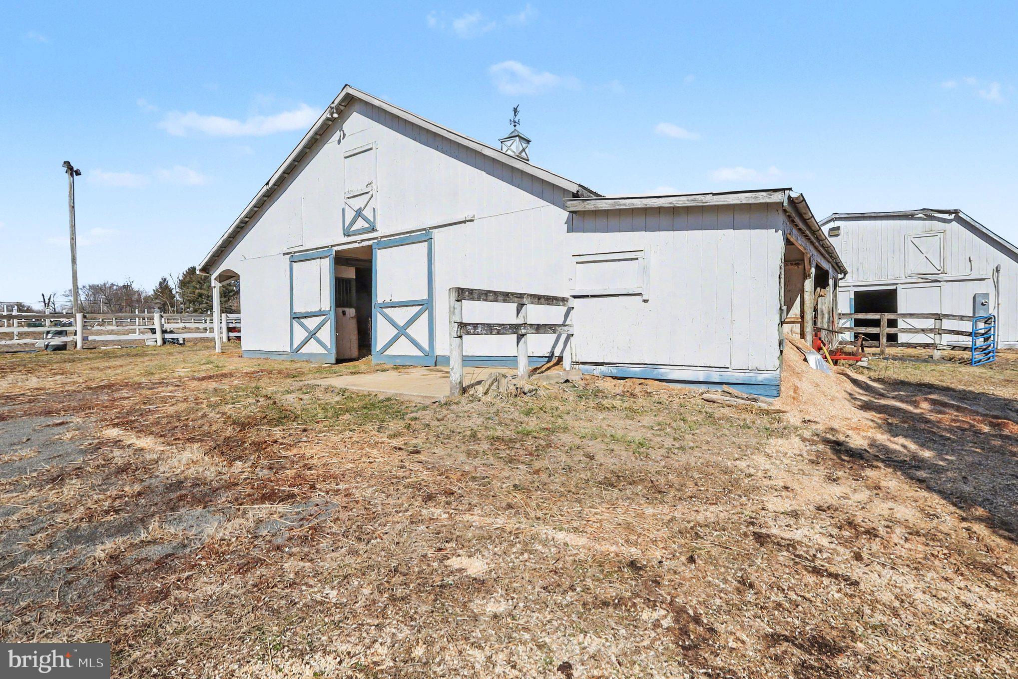 22244 Sam Fred Road Middleburg, VA 20117 - Photo 8 of 51 a view of a house with a yard
