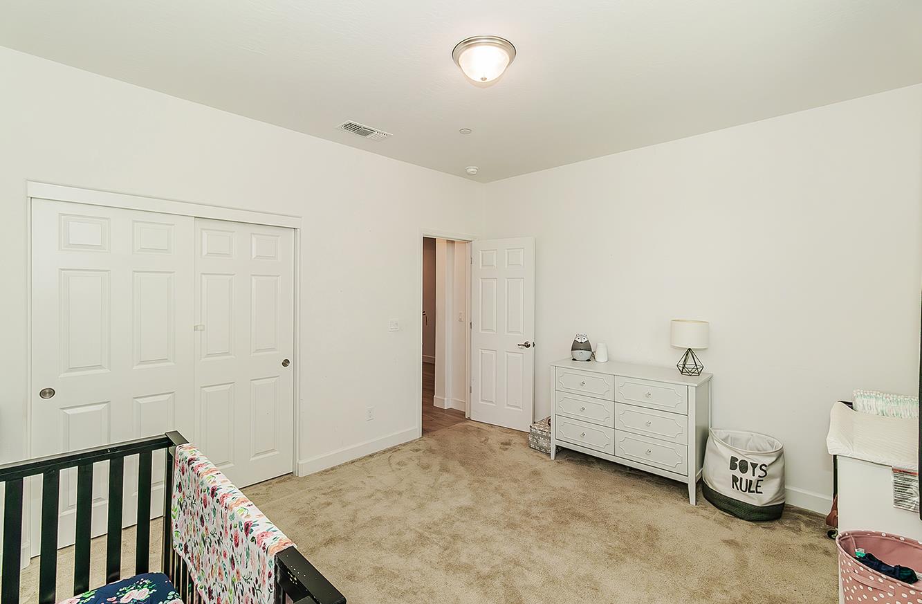 117 Emperor Way Dinuba, CA 93618 - Photo 27 of 32 a view of a room with closet