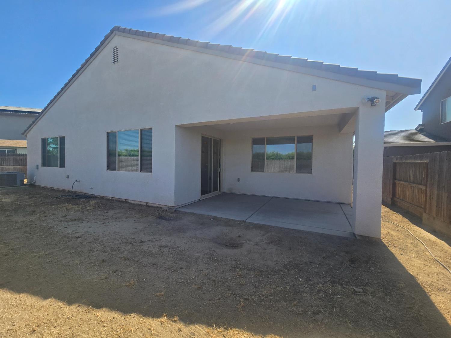 117 Emperor Way Dinuba, CA 93618 - Photo 32 of 32 a view of a house with a yard