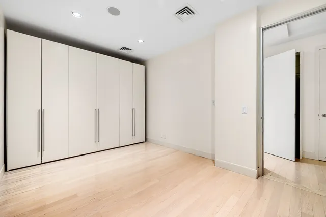 a view of kitchen with wooden floor