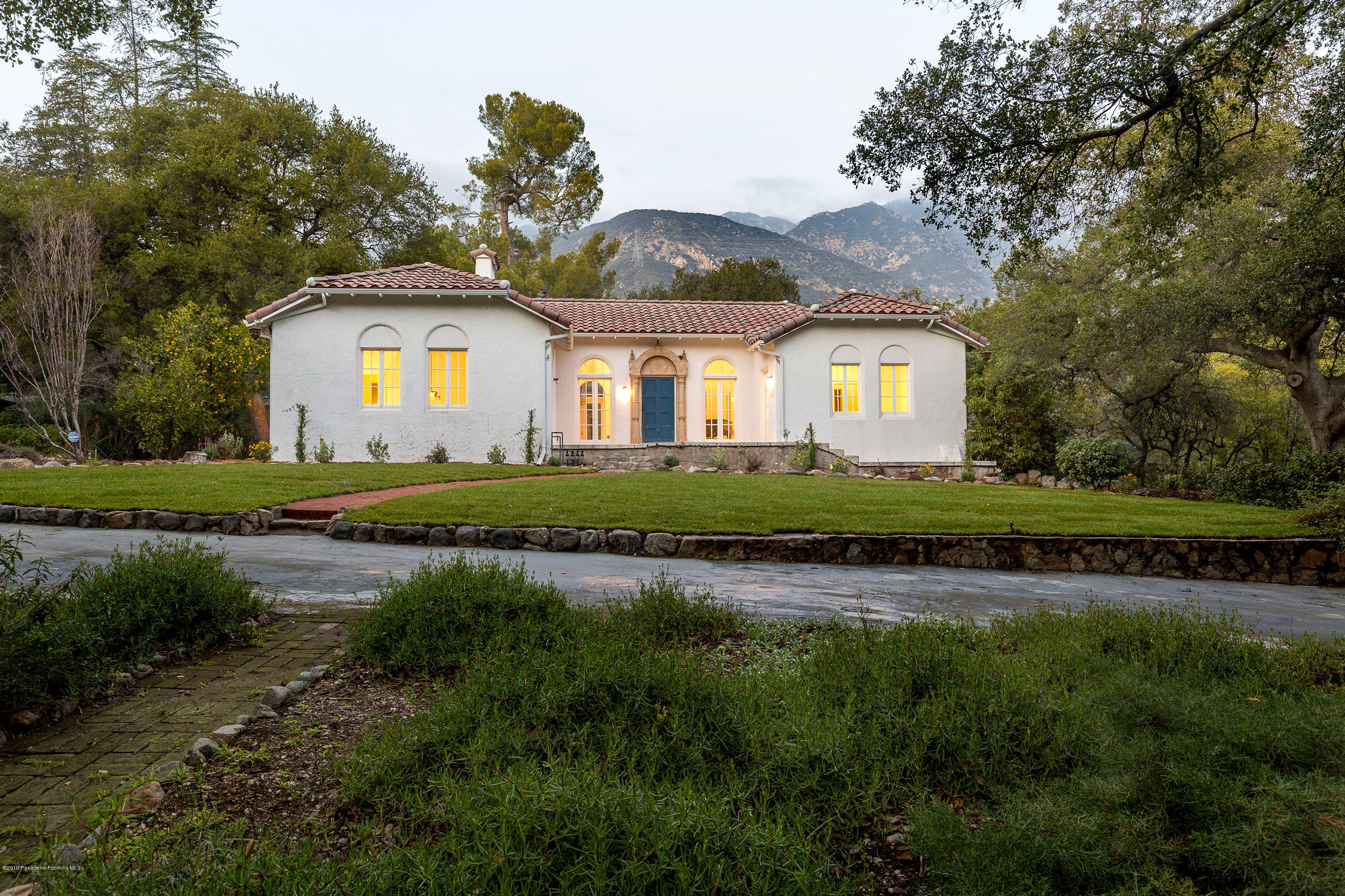 3130 Maiden Lane Altadena, CA 91001 - Photo 2 of 89 a front view of a house with a yard and green space