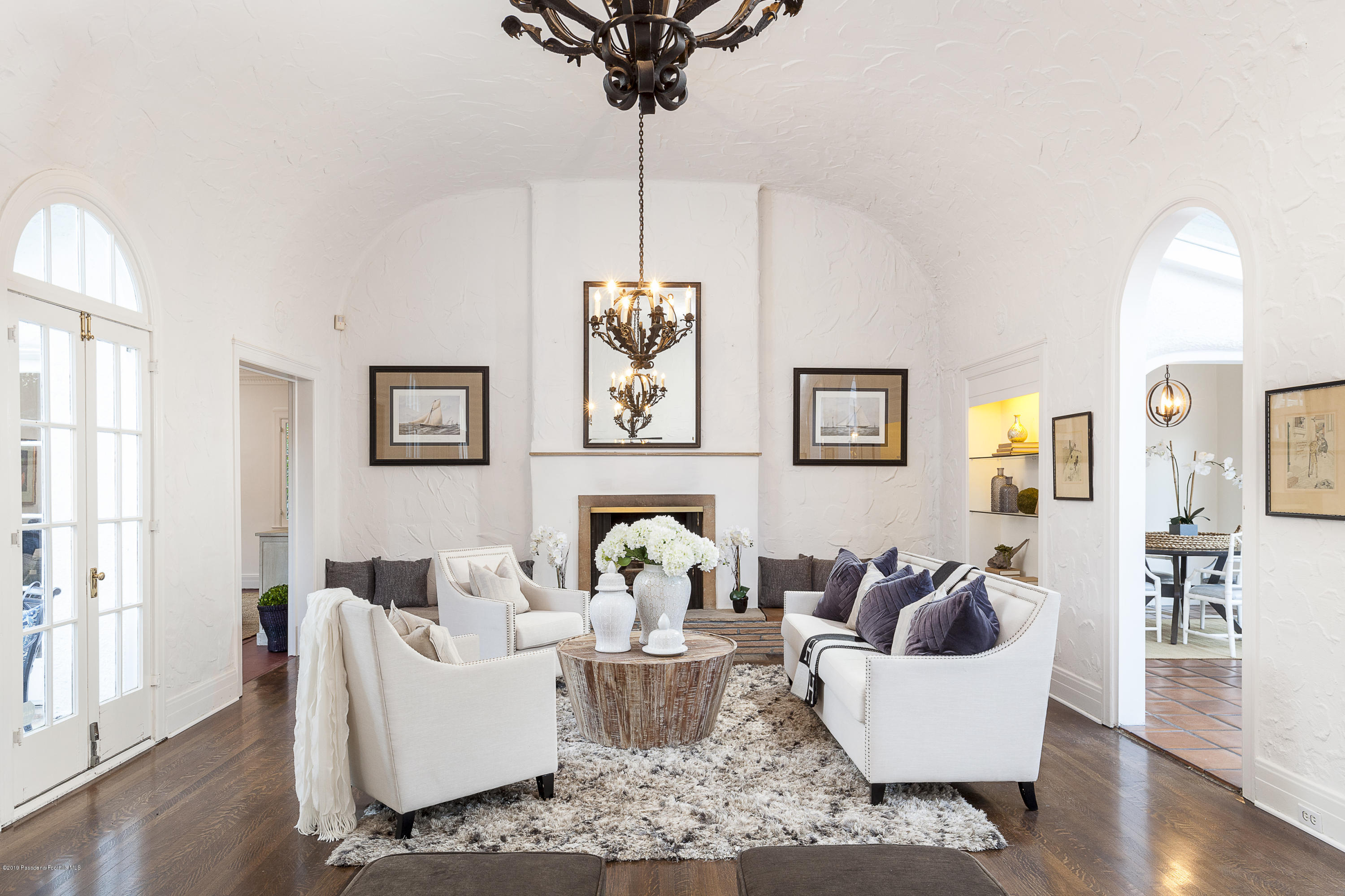 3130 Maiden Lane Altadena, CA 91001 - Photo 12 of 89 a living room with furniture a chandelier and a rug