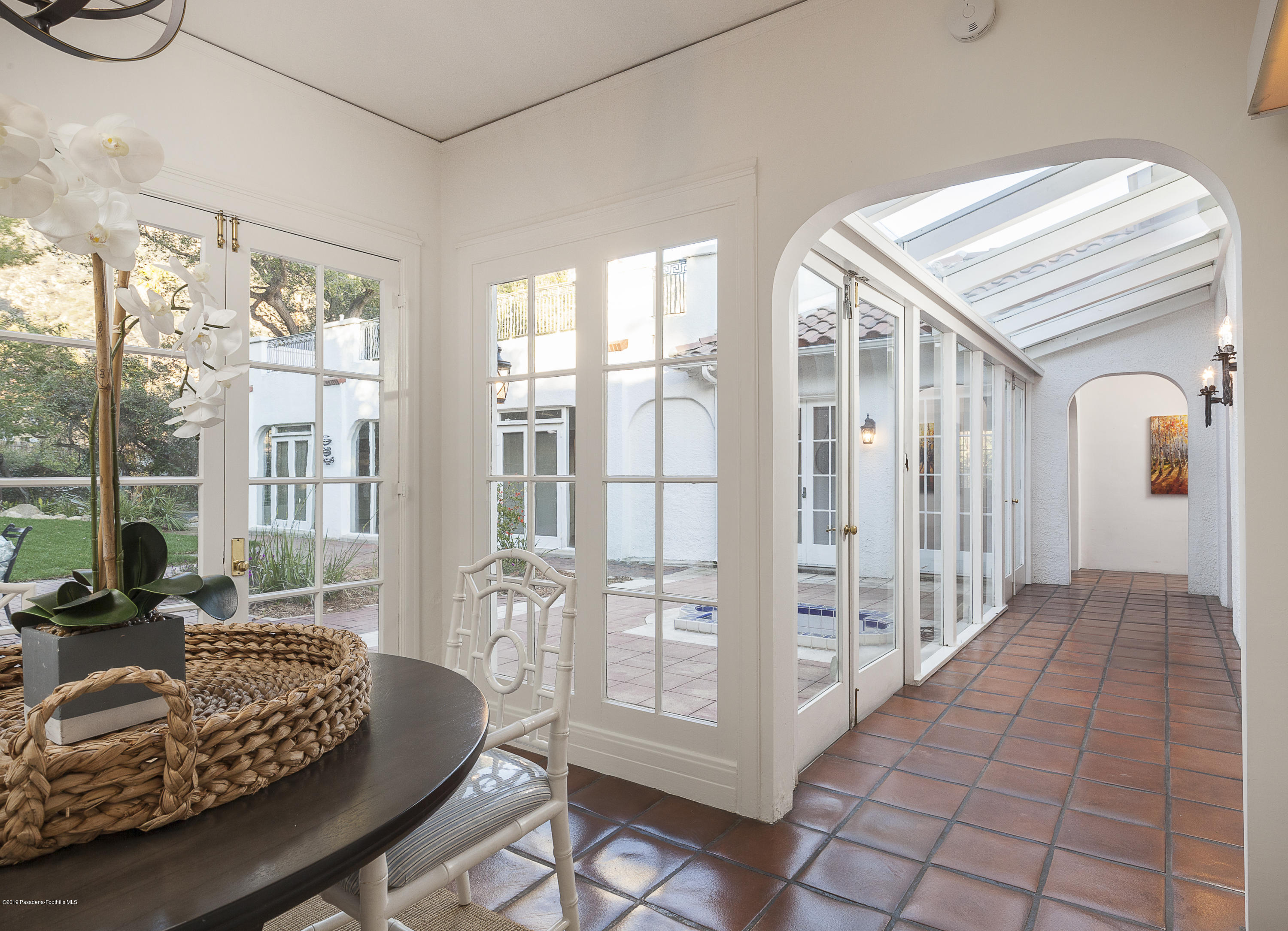 3130 Maiden Lane Altadena, CA 91001 - Photo 23 of 89 a living room with furniture and a floor to ceiling window