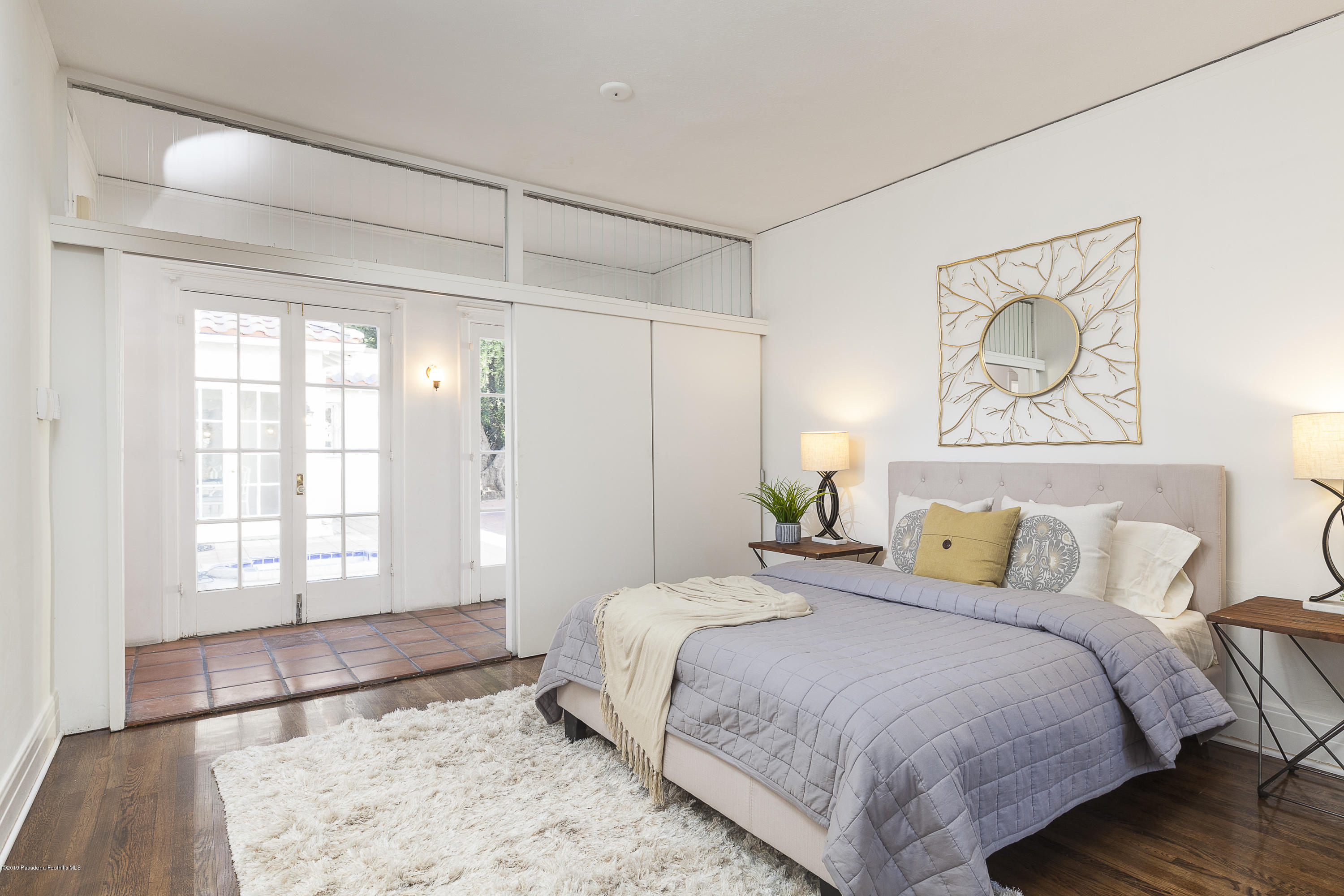 3130 Maiden Lane Altadena, CA 91001 - Photo 38 of 89 a bedroom with a bed and a window