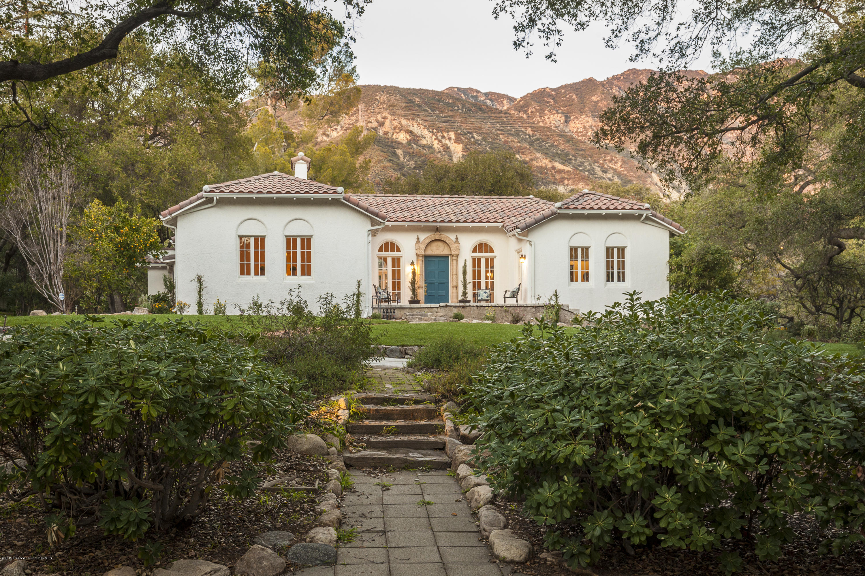3130 Maiden Lane Altadena, CA 91001 - Photo 80 of 89 a view of a house with a yard and potted plants