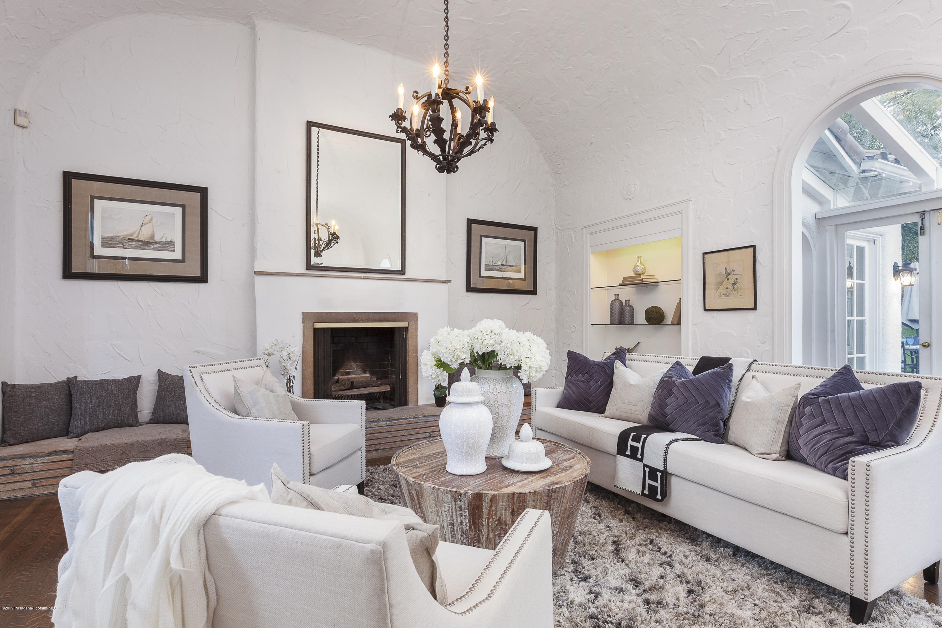 3130 Maiden Lane Altadena, CA 91001 - Photo 9 of 89 a living room with furniture a chandelier and a fireplace