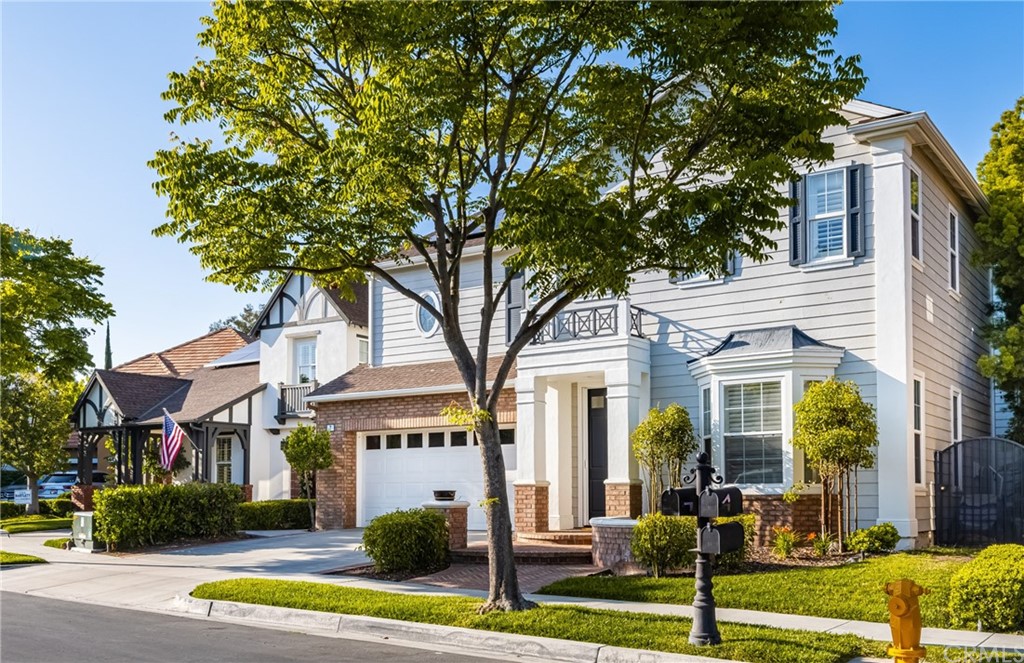 7 Brookwood Street Ladera Ranch, CA 92694 - Photo 1 of 1 a view of a white house with a large tree and a yard with plants