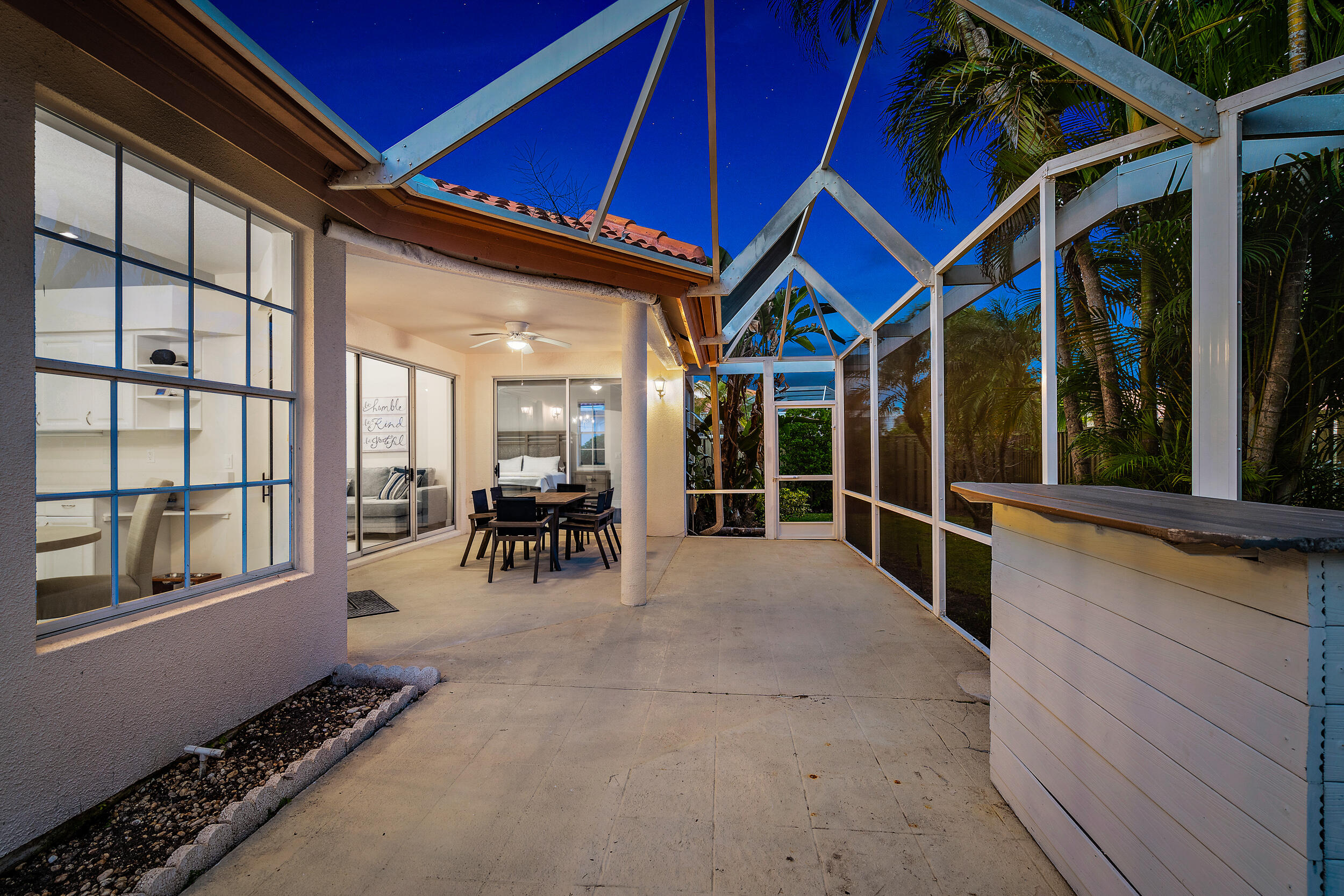 207 Eagleton Estates Boulevard Palm Beach Gardens, FL 33418 - Photo 29 of 34 a view of an chairs and table in the balcony