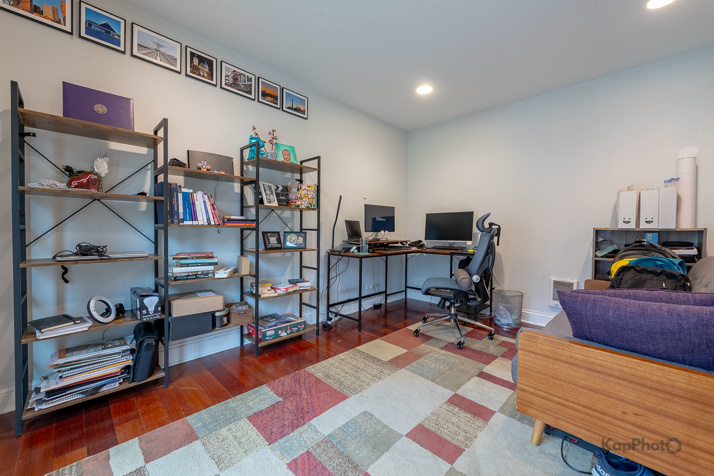 2340 West Adams Street, Unit 32 Chicago, IL 60612 - Photo 13 of 31 a room with furniture and a flat screen tv