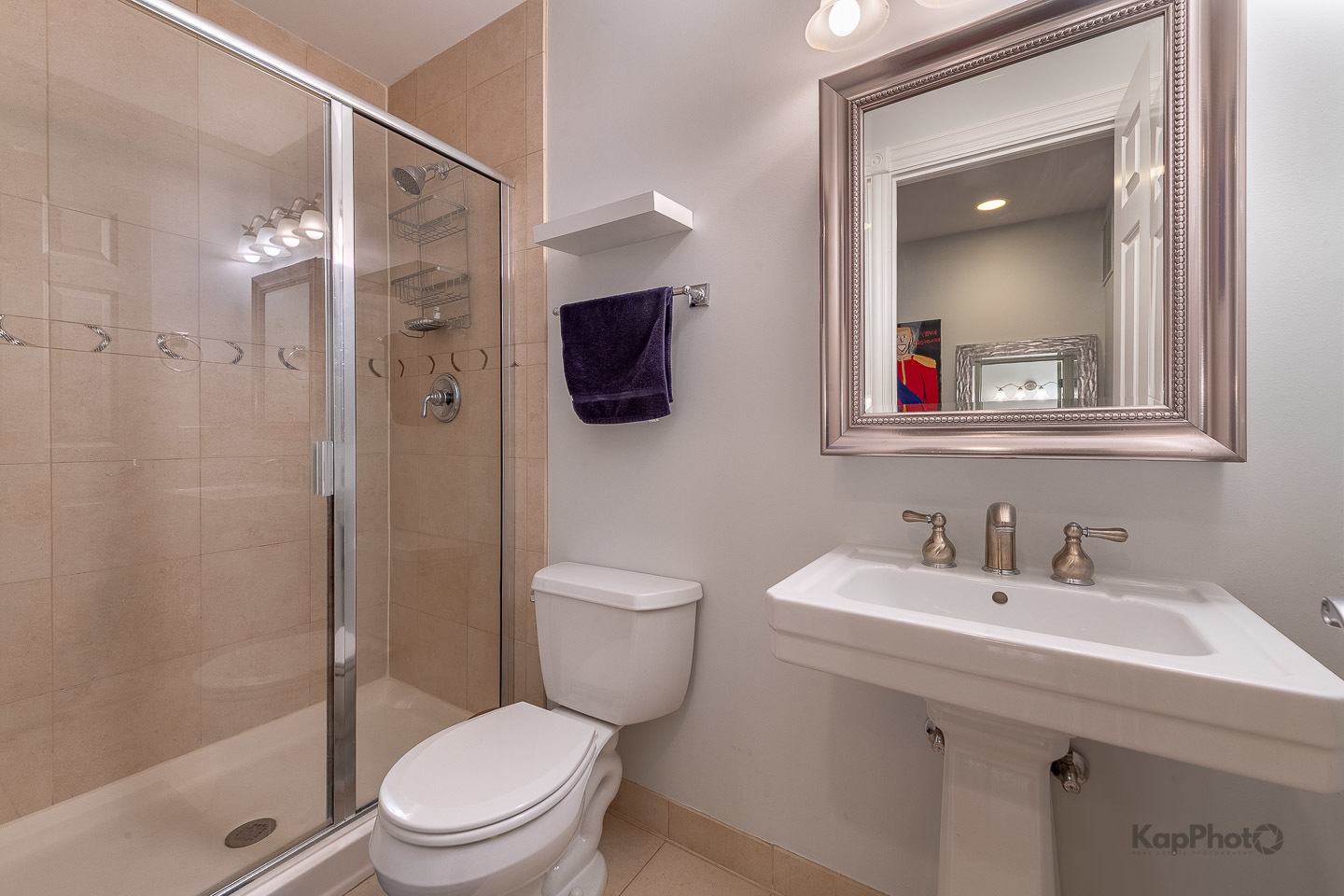 2340 West Adams Street, Unit 32 Chicago, IL 60612 - Photo 21 of 31 a bathroom with a toilet a sink and mirror