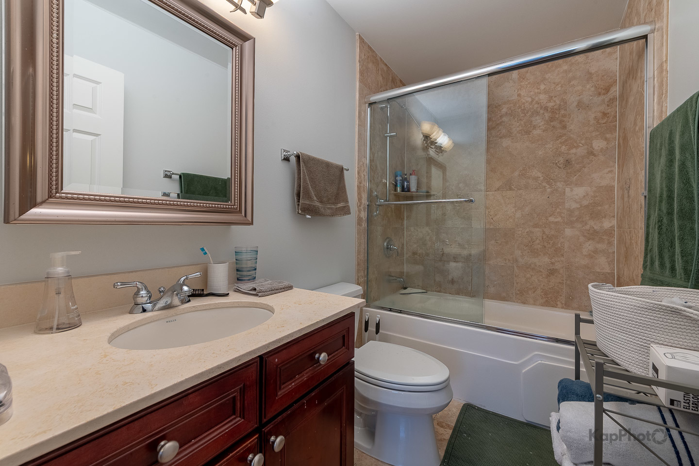 2340 West Adams Street, Unit 32 Chicago, IL 60612 - Photo 22 of 31 a bathroom with a sink a toilet and shower