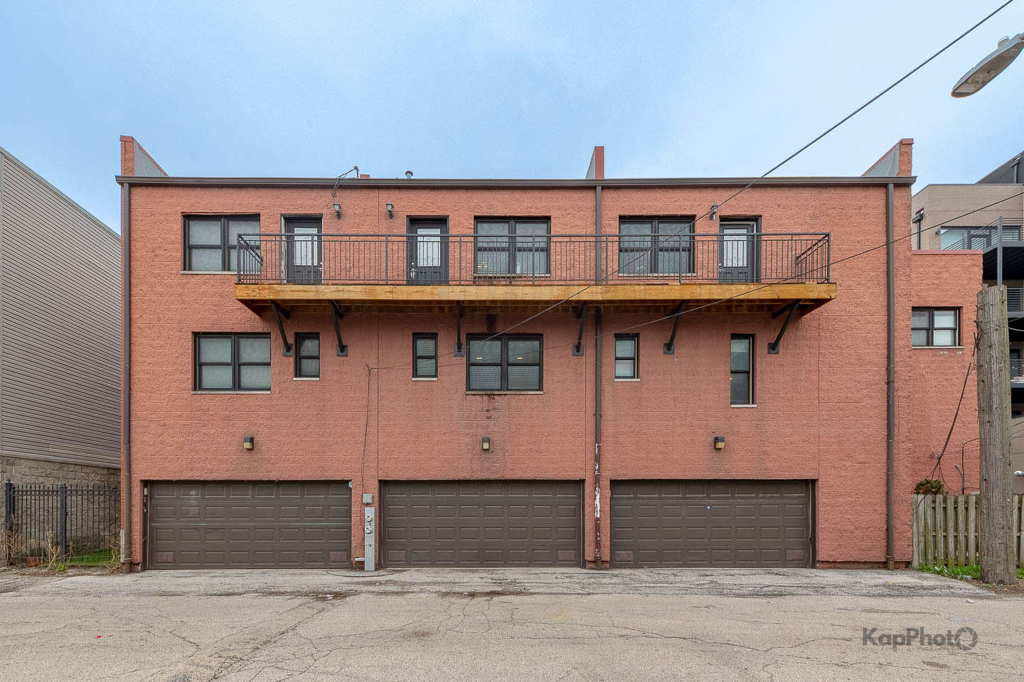 2340 West Adams Street, Unit 32 Chicago, IL 60612 - Photo 25 of 31 a front view of a house with a garage