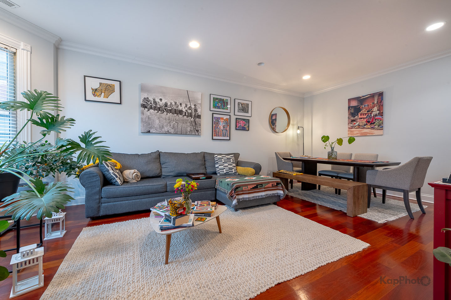 2340 West Adams Street, Unit 32 Chicago, IL 60612 - Photo 7 of 31 a living room with furniture potted plant and wooden floor