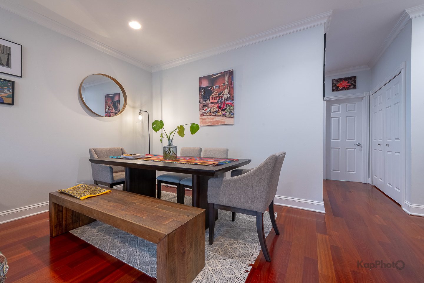2340 West Adams Street, Unit 32 Chicago, IL 60612 - Photo 8 of 31 a view of a dining room with furniture and wooden floor
