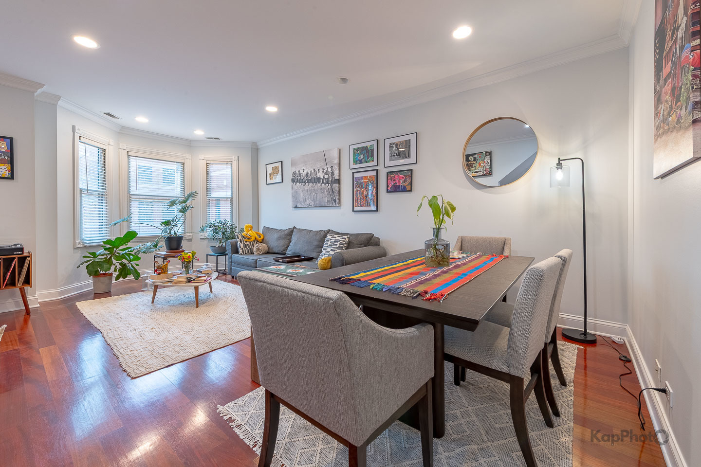 2340 West Adams Street, Unit 32 Chicago, IL 60612 - Photo 9 of 31 a living room with furniture a rug and a window