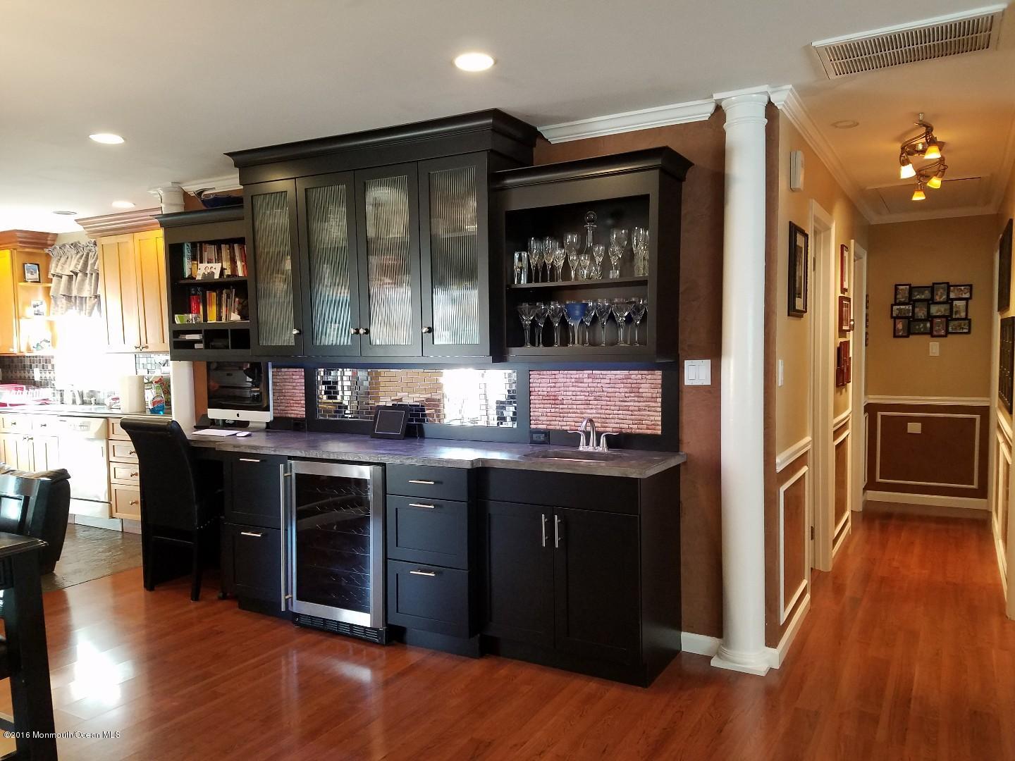181 Stowaway Road Manahawkin, NJ 08050 - Photo 6 of 6 a kitchen with stainless steel appliances granite countertop a refrigerator and a sink