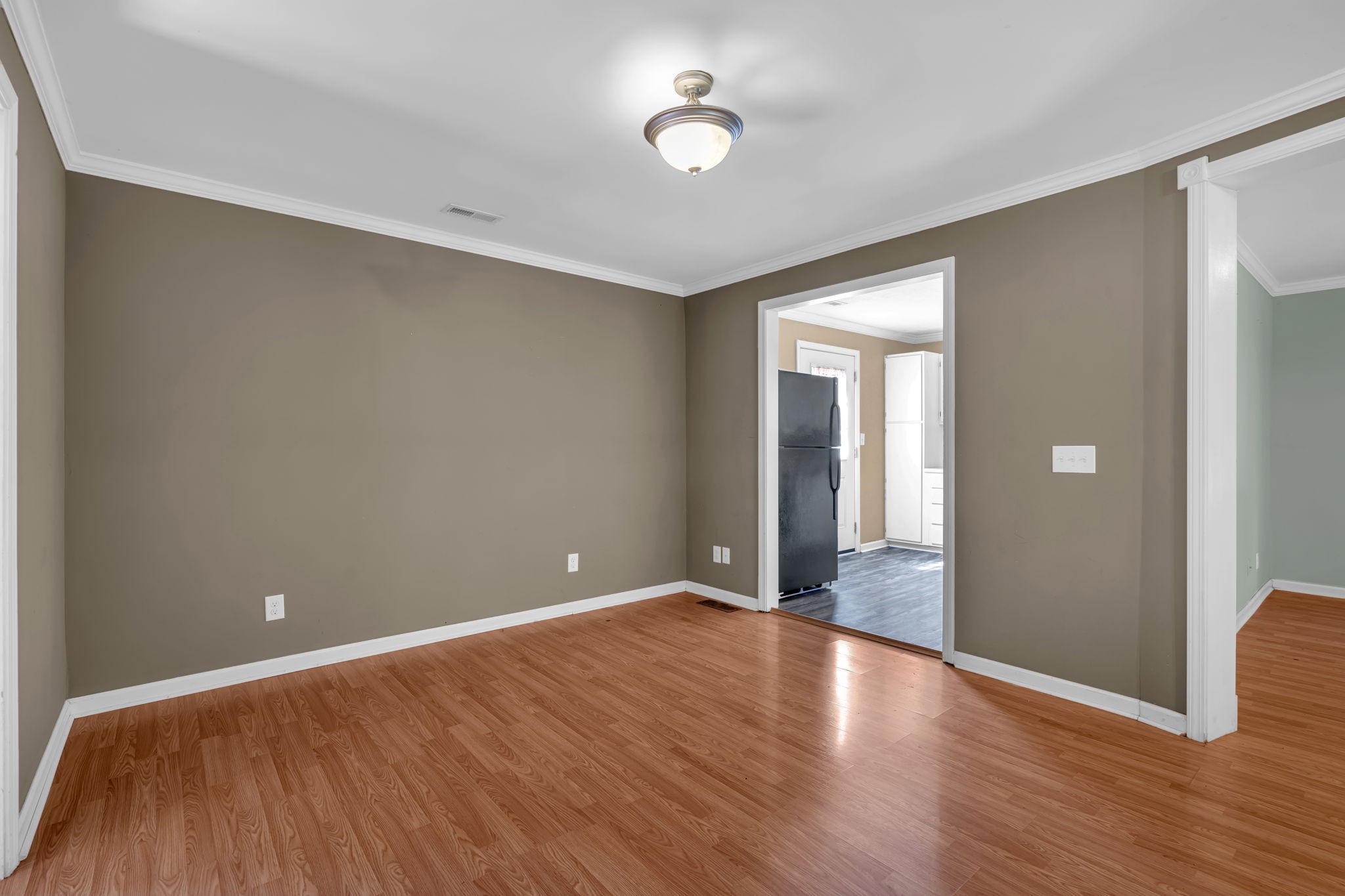 1297 Dry Creek Road Ashland City, TN 37015 - Photo 12 of 27 a view of an empty room with wooden floor