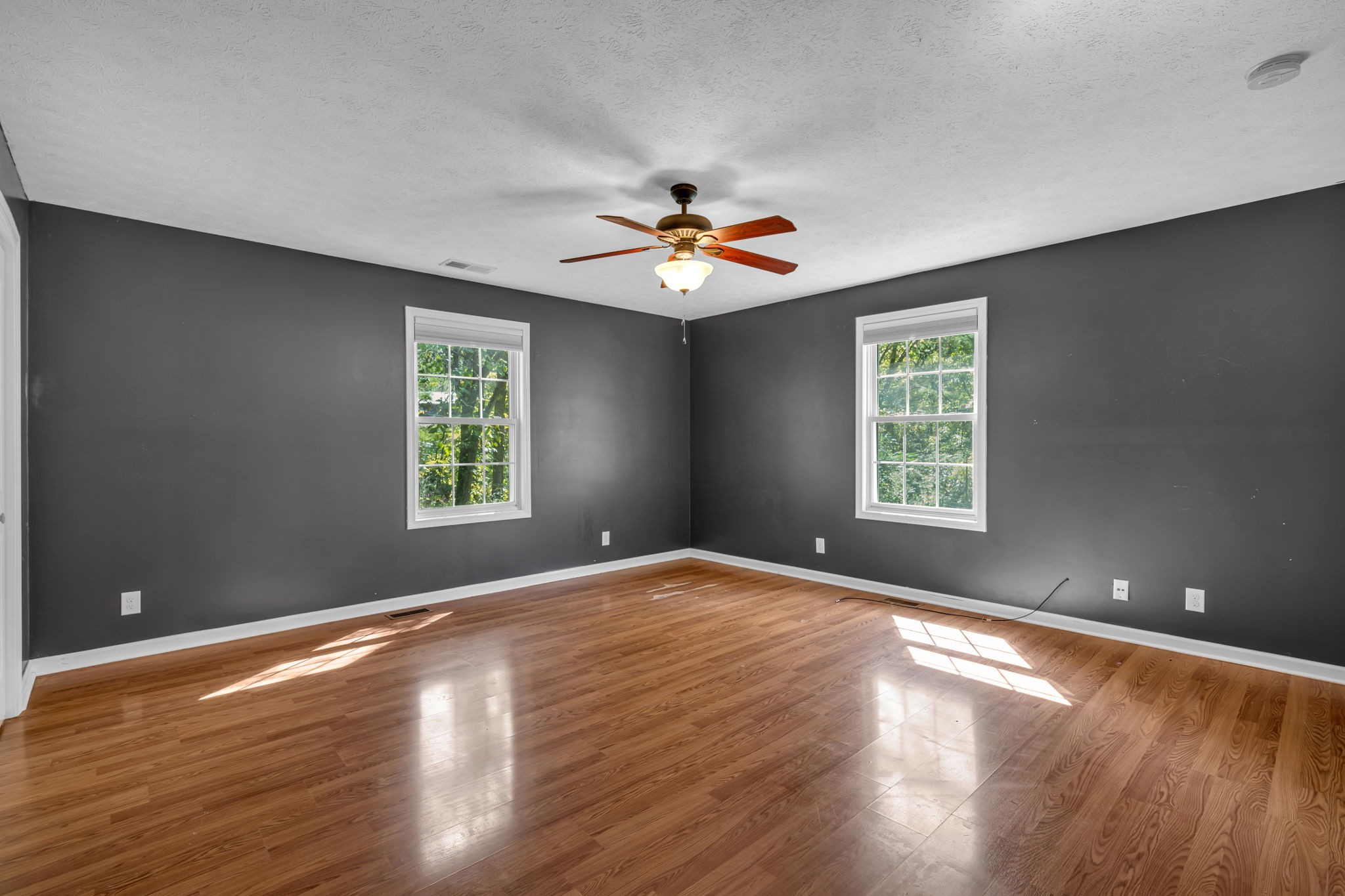 1297 Dry Creek Road Ashland City, TN 37015 - Photo 16 of 27 wooden floor in an empty room with a window