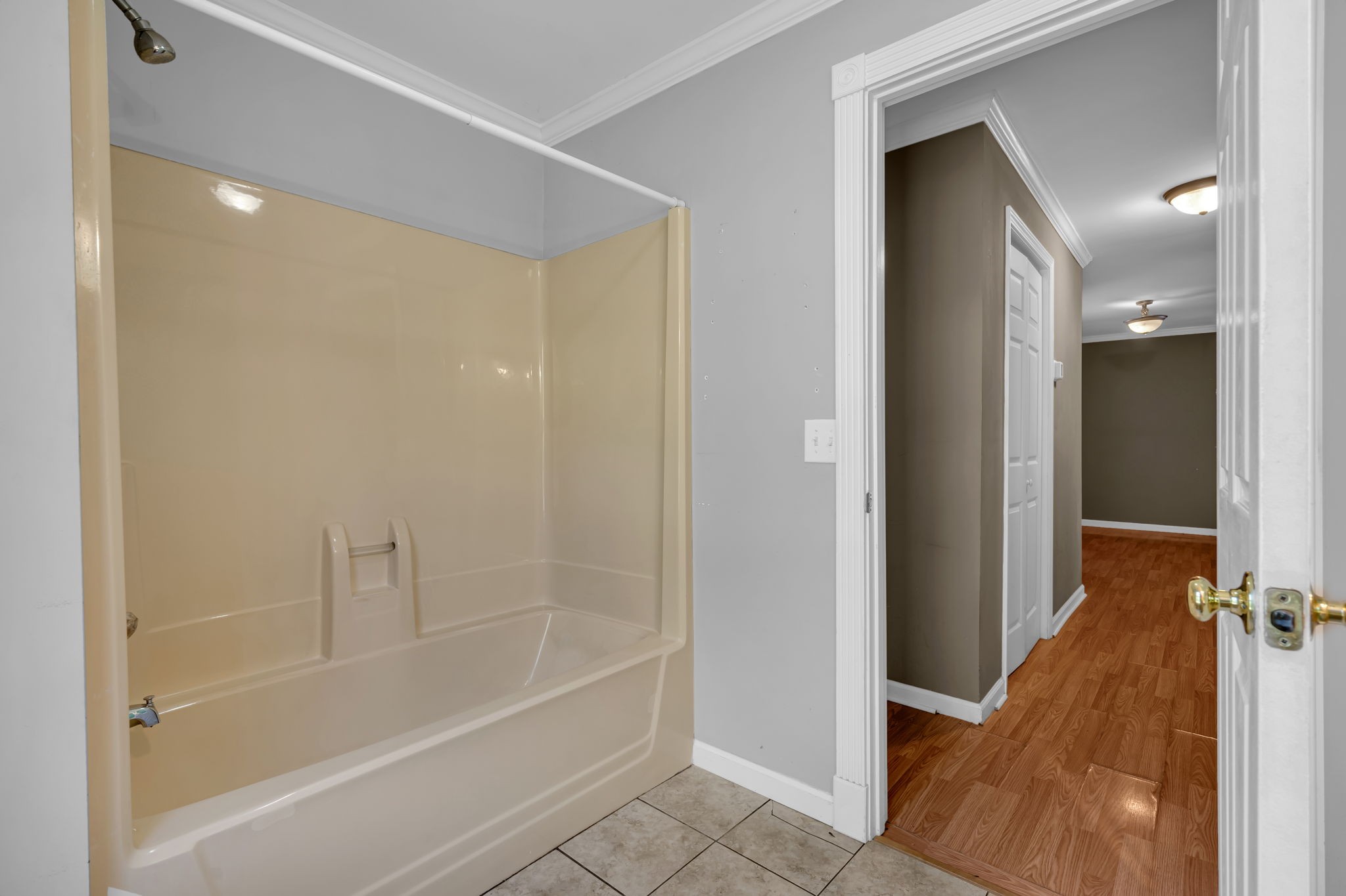 1297 Dry Creek Road Ashland City, TN 37015 - Photo 22 of 27 a bathroom with a bathtub