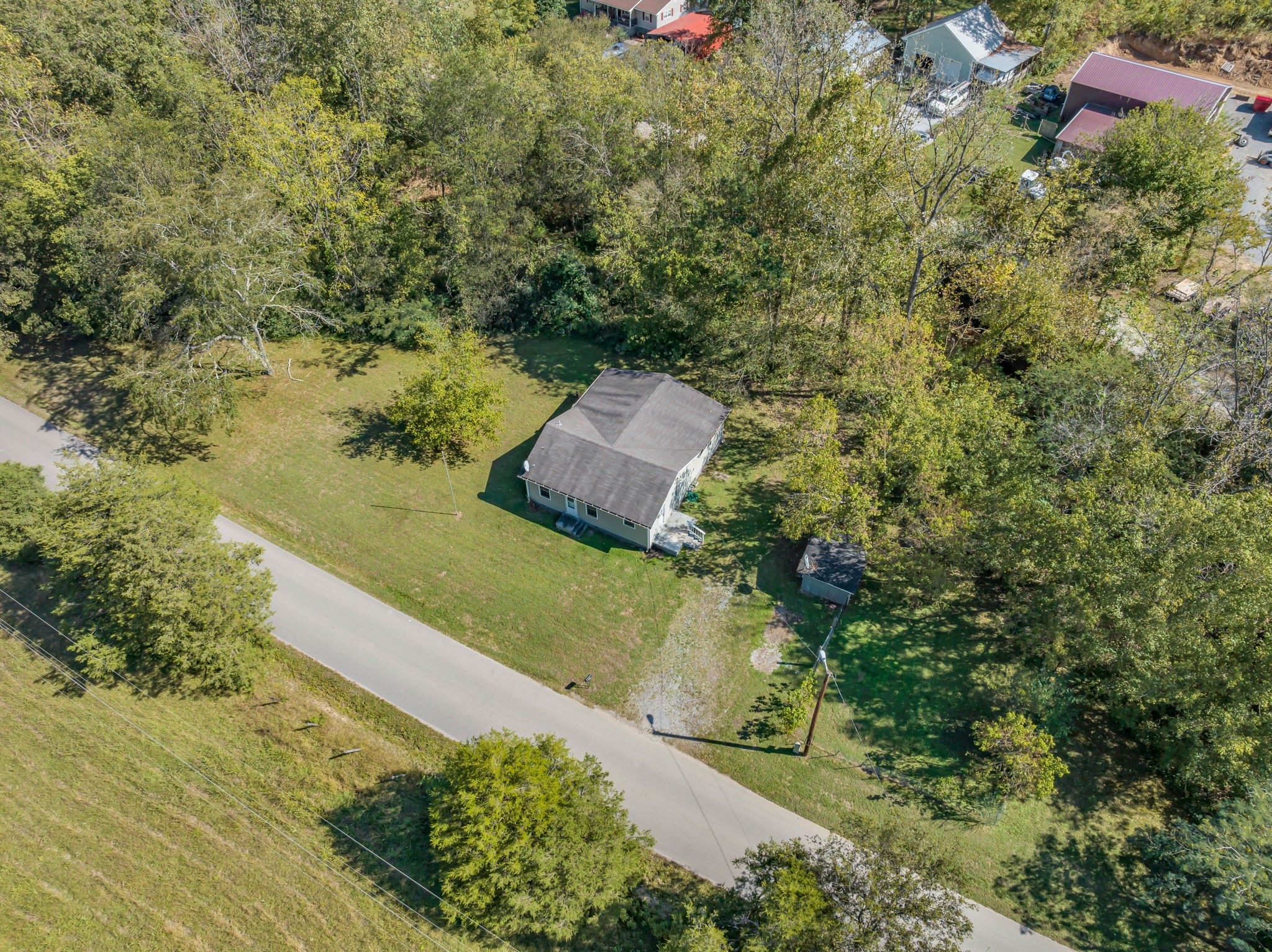 1297 Dry Creek Road Ashland City, TN 37015 - Photo 25 of 27 a view of a yard with a house
