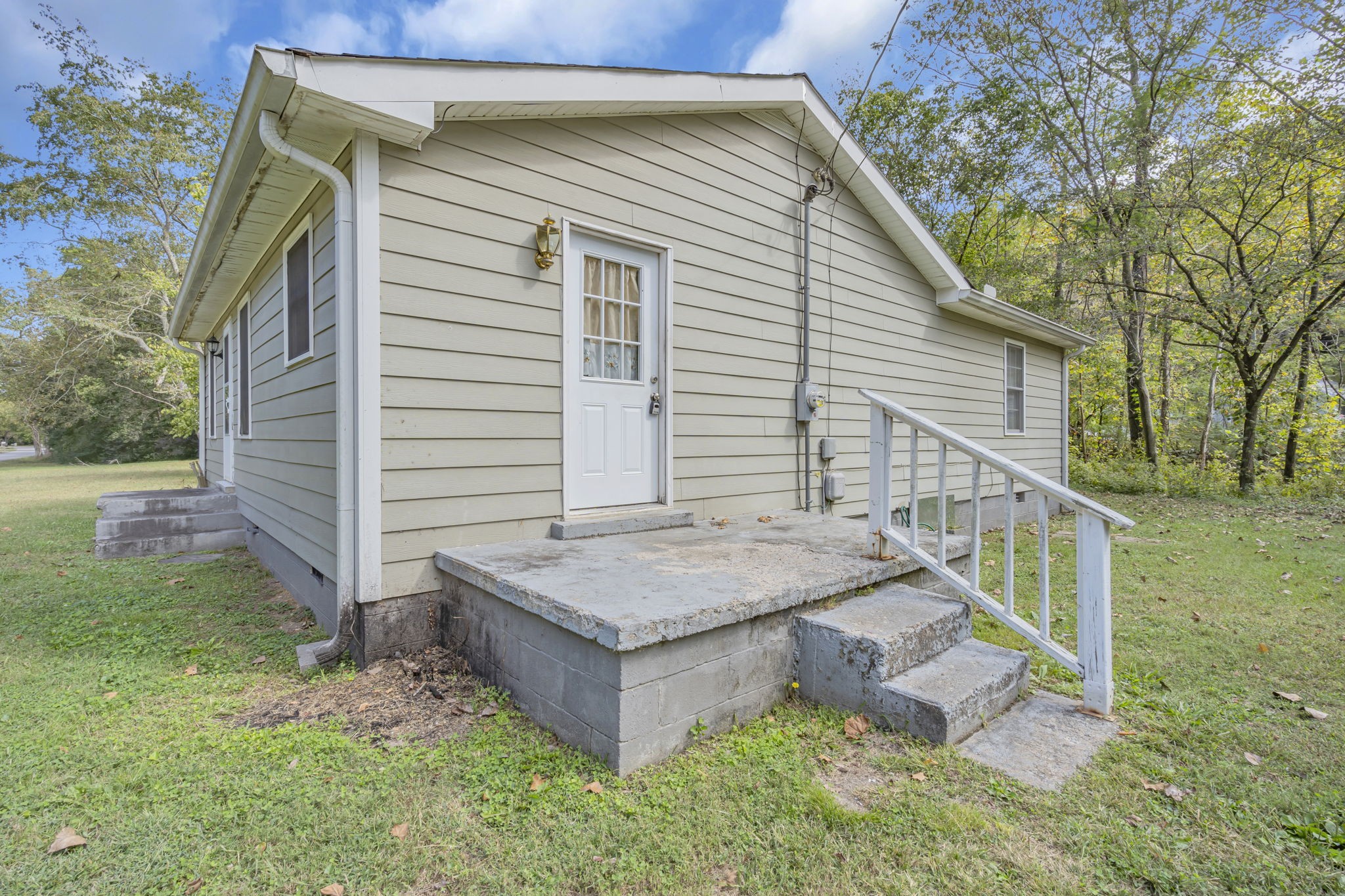 1297 Dry Creek Road Ashland City, TN 37015 - Photo 3 of 27 a house view with a backyard space