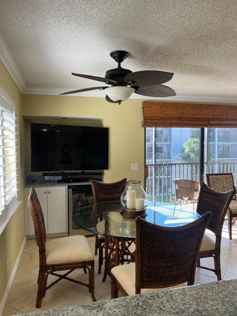 1605 Highway 1, Unit A301 Jupiter, FL 33477 - Photo 16 of 35 a living room with furniture and a flat screen tv