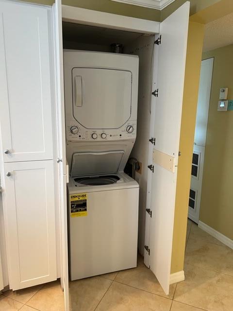 1605 Highway 1, Unit A301 Jupiter, FL 33477 - Photo 19 of 35 a utility room with dryer and washer