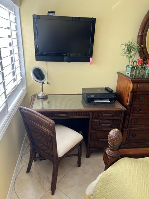 1605 Highway 1, Unit A301 Jupiter, FL 33477 - Photo 27 of 35 a living room with furniture and a flat screen tv