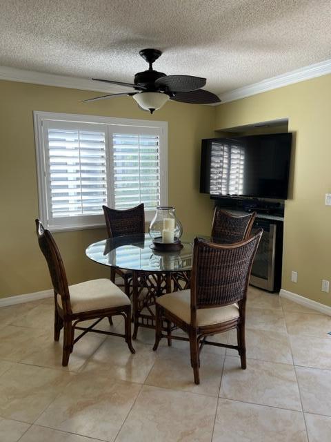1605 Highway 1, Unit A301 Jupiter, FL 33477 - Photo 6 of 35 a dining room with furniture and window