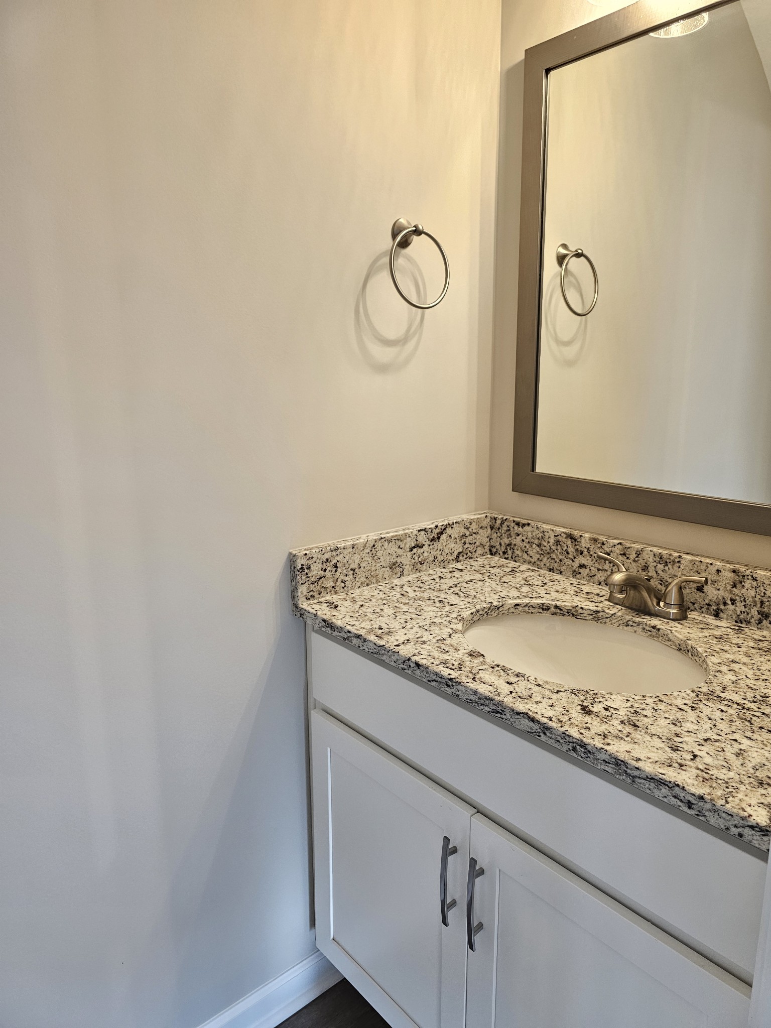 503 9th Street, Unit B Clarksville, TN 37040 - Photo 6 of 13 a bathroom with a granite countertop sink and a mirror