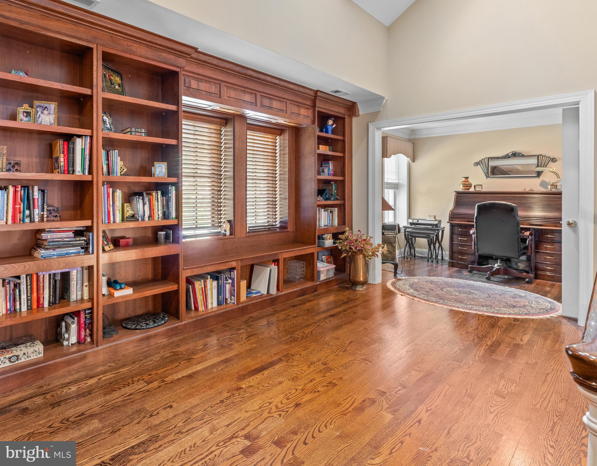 825 Hagys Ford Road Penn Valley, PA 19072 - Photo 30 of 45 a living room with furniture and a book shelf