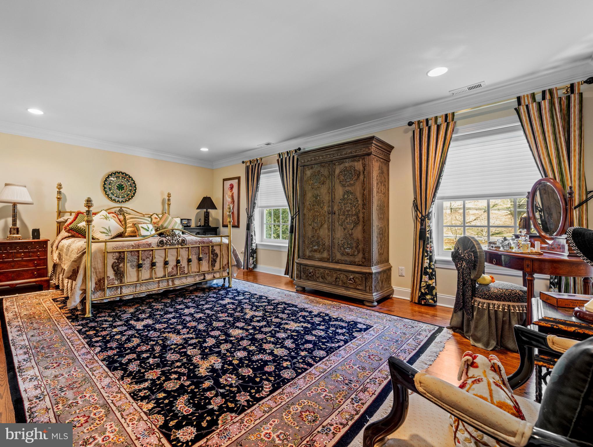 825 Hagys Ford Road Penn Valley, PA 19072 - Photo 31 of 45 a bedroom with furniture and a window