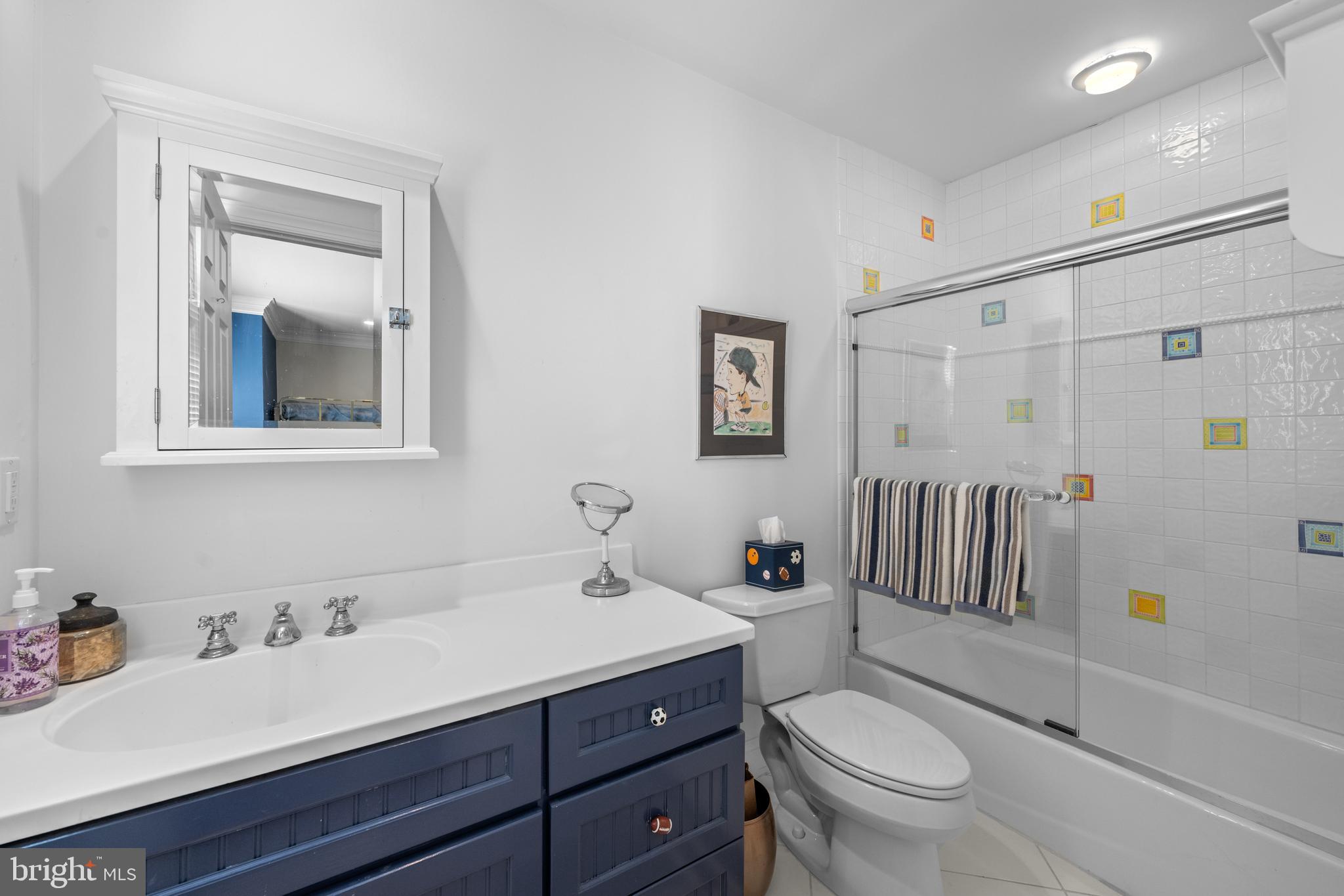 825 Hagys Ford Road Penn Valley, PA 19072 - Photo 36 of 45 a bathroom with a sink toilet and shower