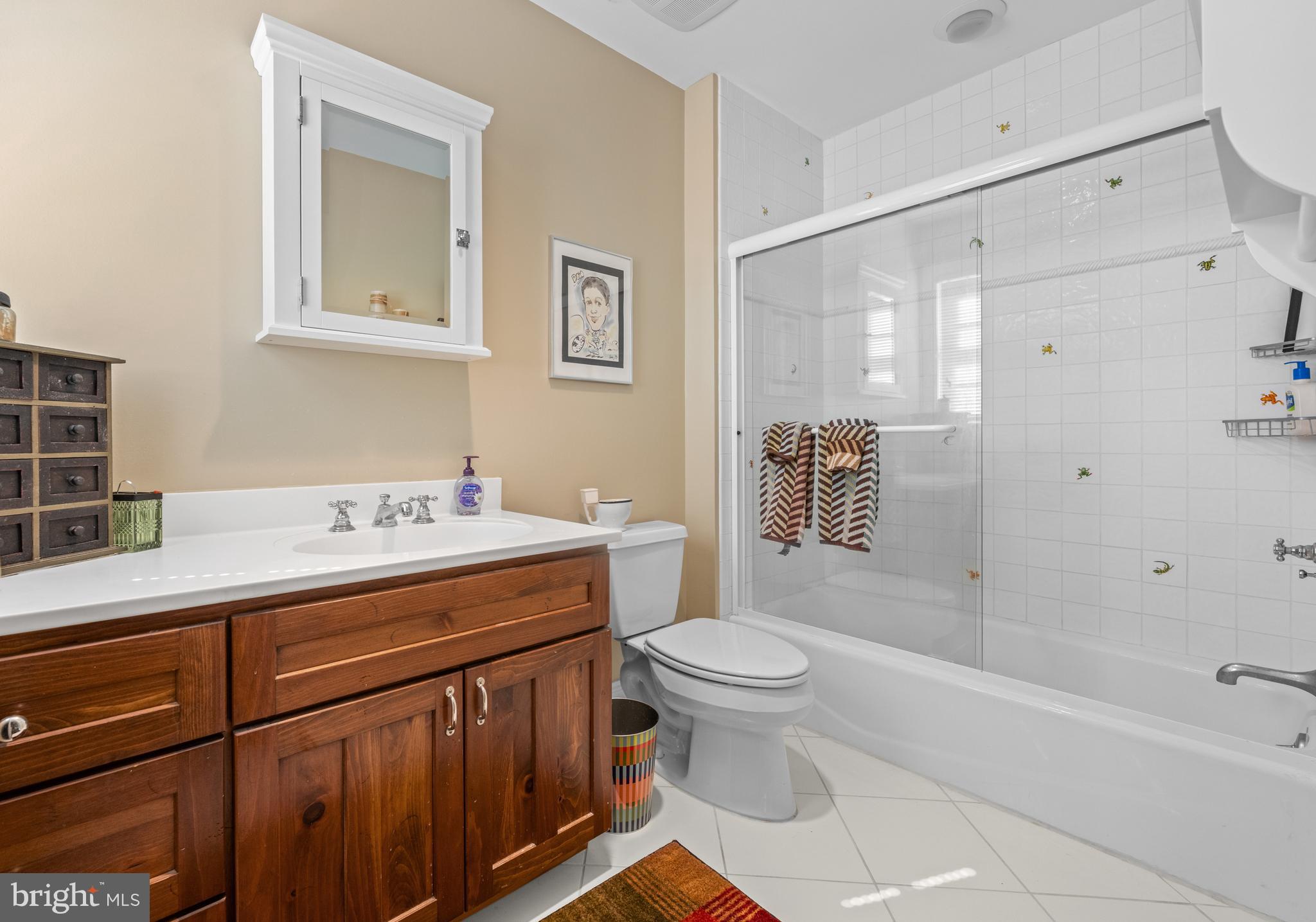 825 Hagys Ford Road Penn Valley, PA 19072 - Photo 38 of 45 a bathroom with a sink a toilet and shower