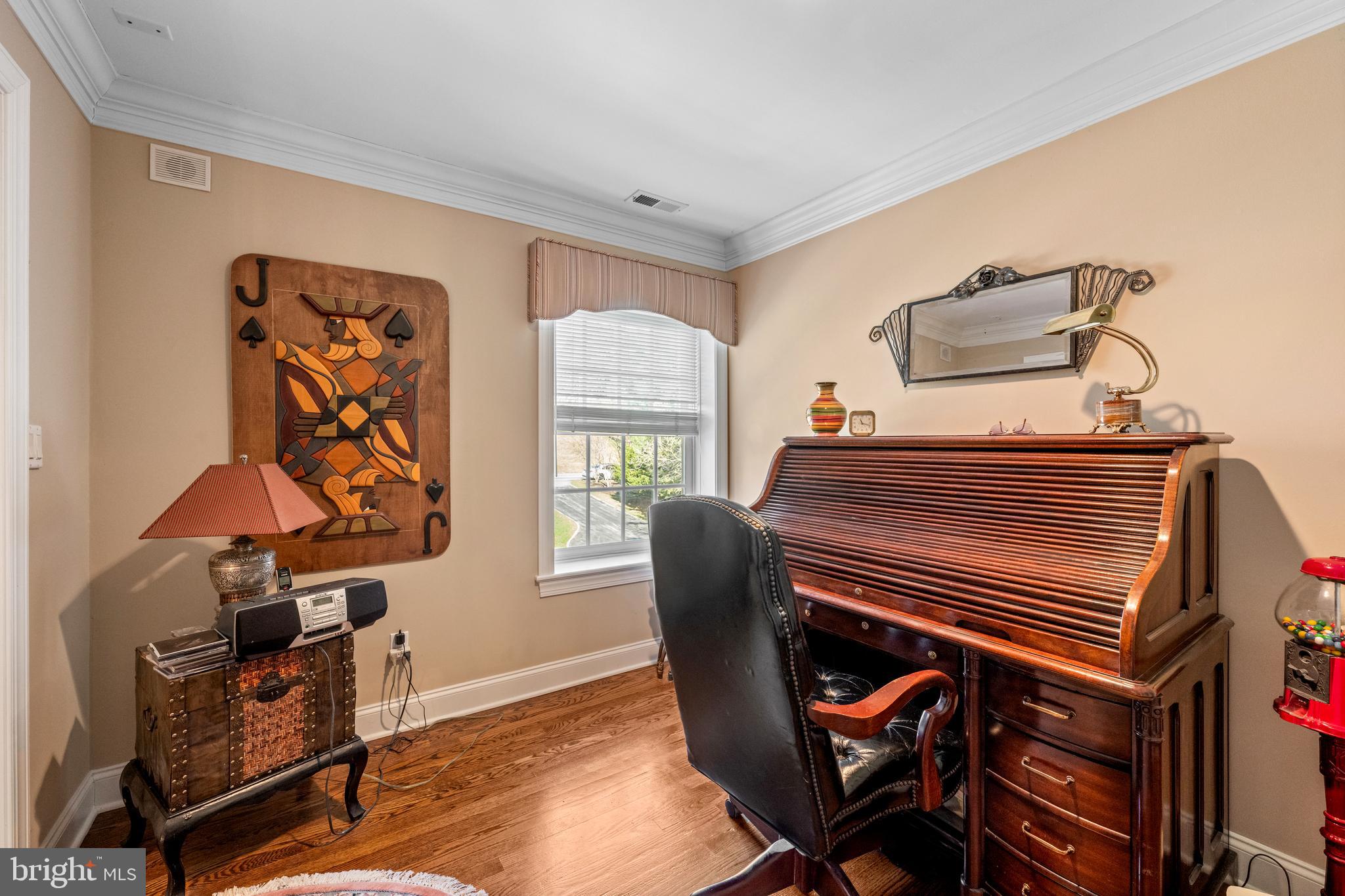 825 Hagys Ford Road Penn Valley, PA 19072 - Photo 41 of 45 a bedroom with furniture and a window
