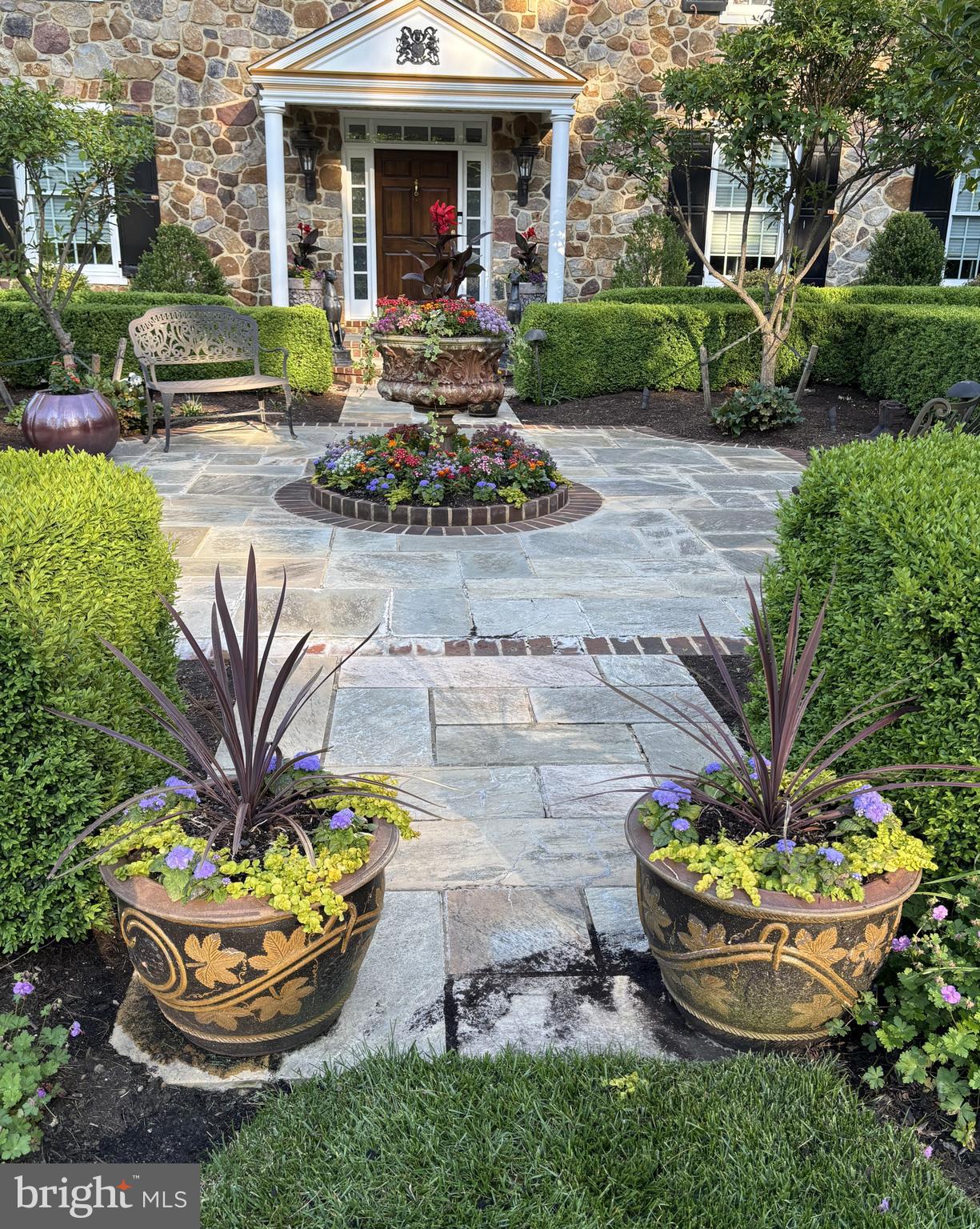 825 Hagys Ford Road Penn Valley, PA 19072 - Photo 6 of 45 a front view of a house with a fountain and a fountain