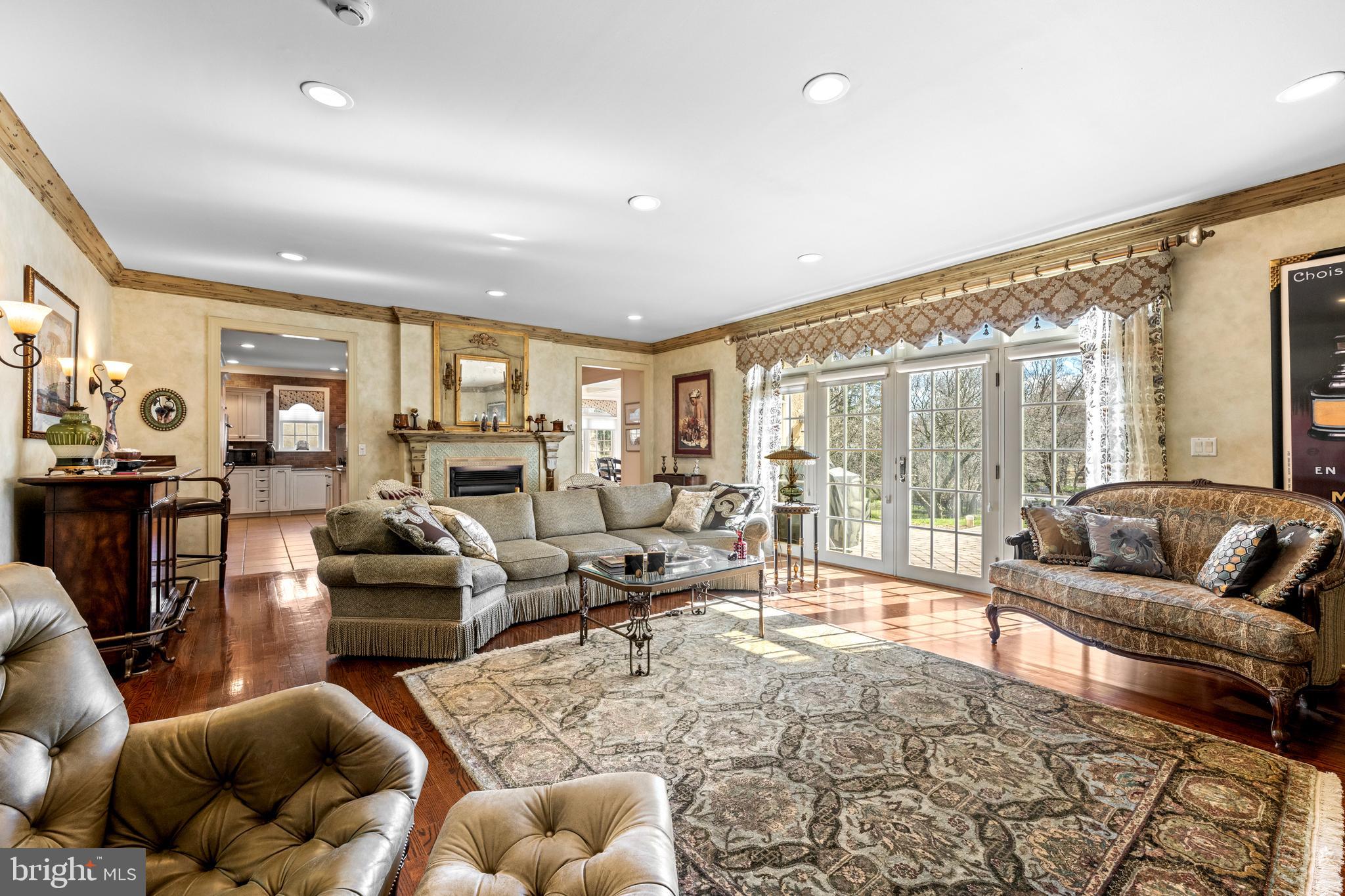 825 Hagys Ford Road Penn Valley, PA 19072 - Photo 9 of 45 a living room with furniture and a large window
