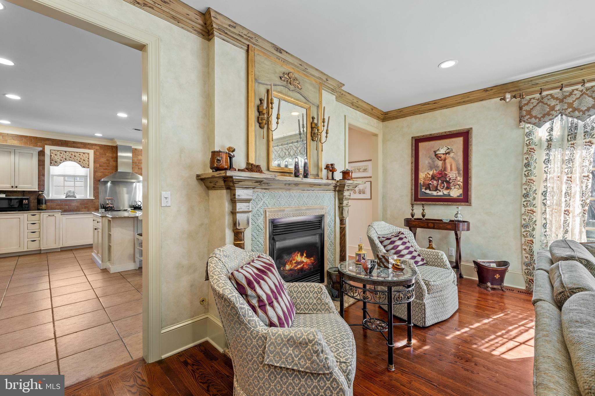825 Hagys Ford Road Penn Valley, PA 19072 - Photo 10 of 45 a living room with furniture and a fireplace