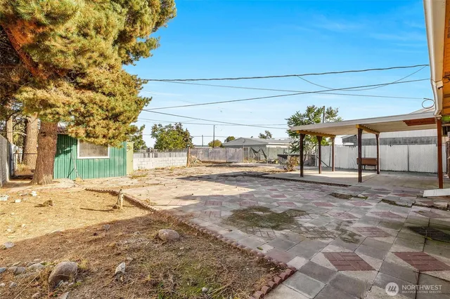 a big house with palm trees in front of it